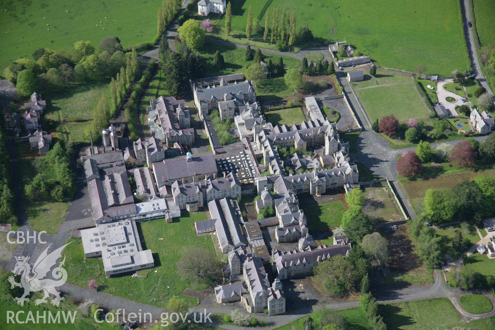 RCAHMW digital colour oblique photograph of the North Wales Hospital Complex viewed from the south-east. Taken on 05/05/2006 by T.G. Driver.