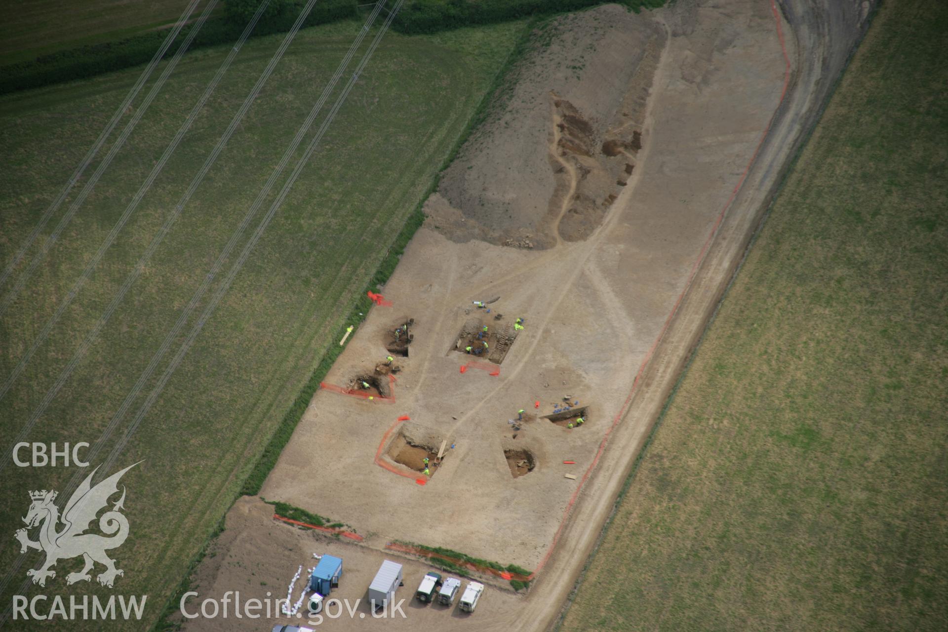 RCAHMW colour oblique aerial photograph of Vaynor Farm Henge showing excavations. Taken on 15 June 2006 by Toby Driver.