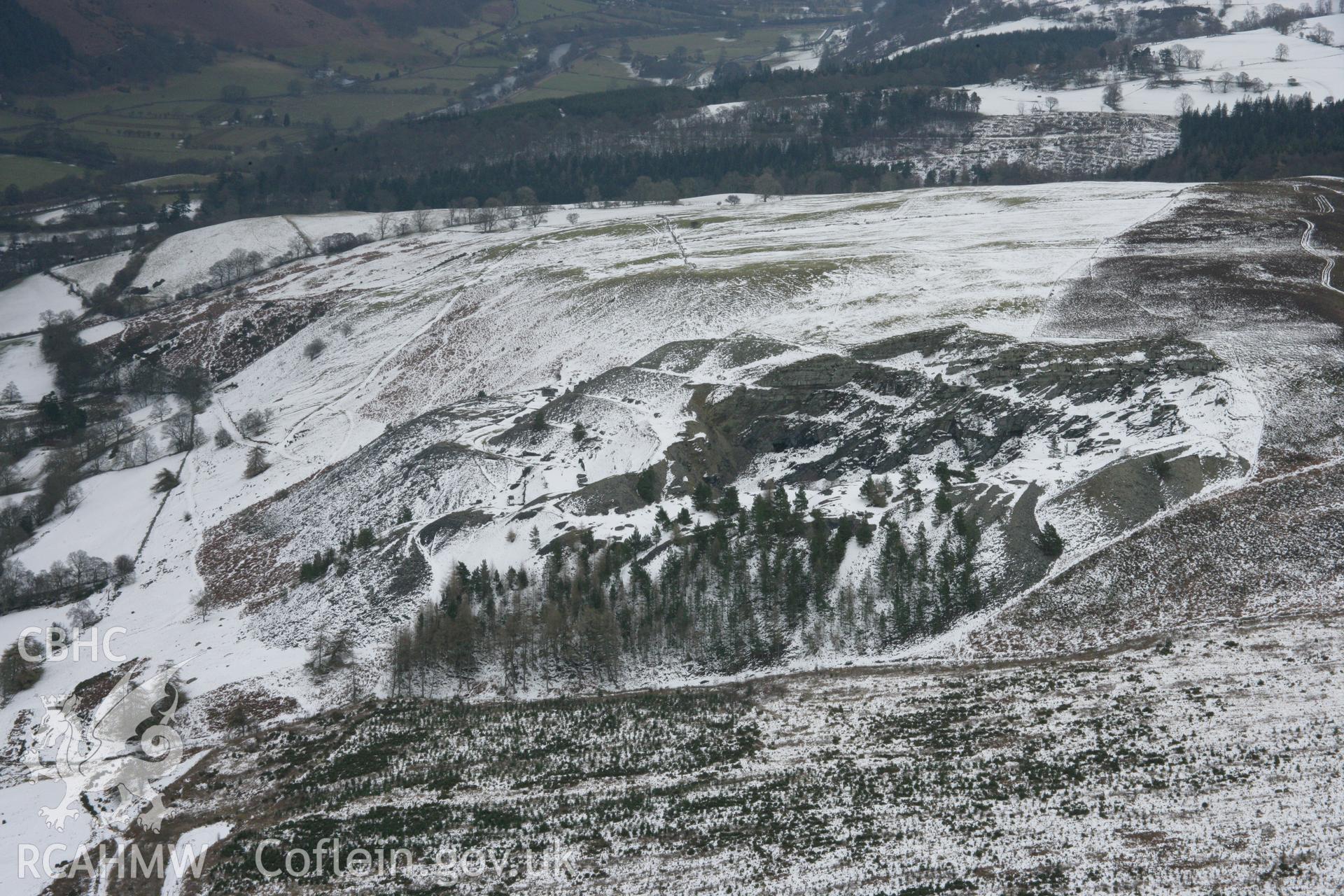 RCAHMW colour oblique aerial photograph of Penarth Slate Quarry, Corwen. Taken on 06 March 2006 by Toby Driver.