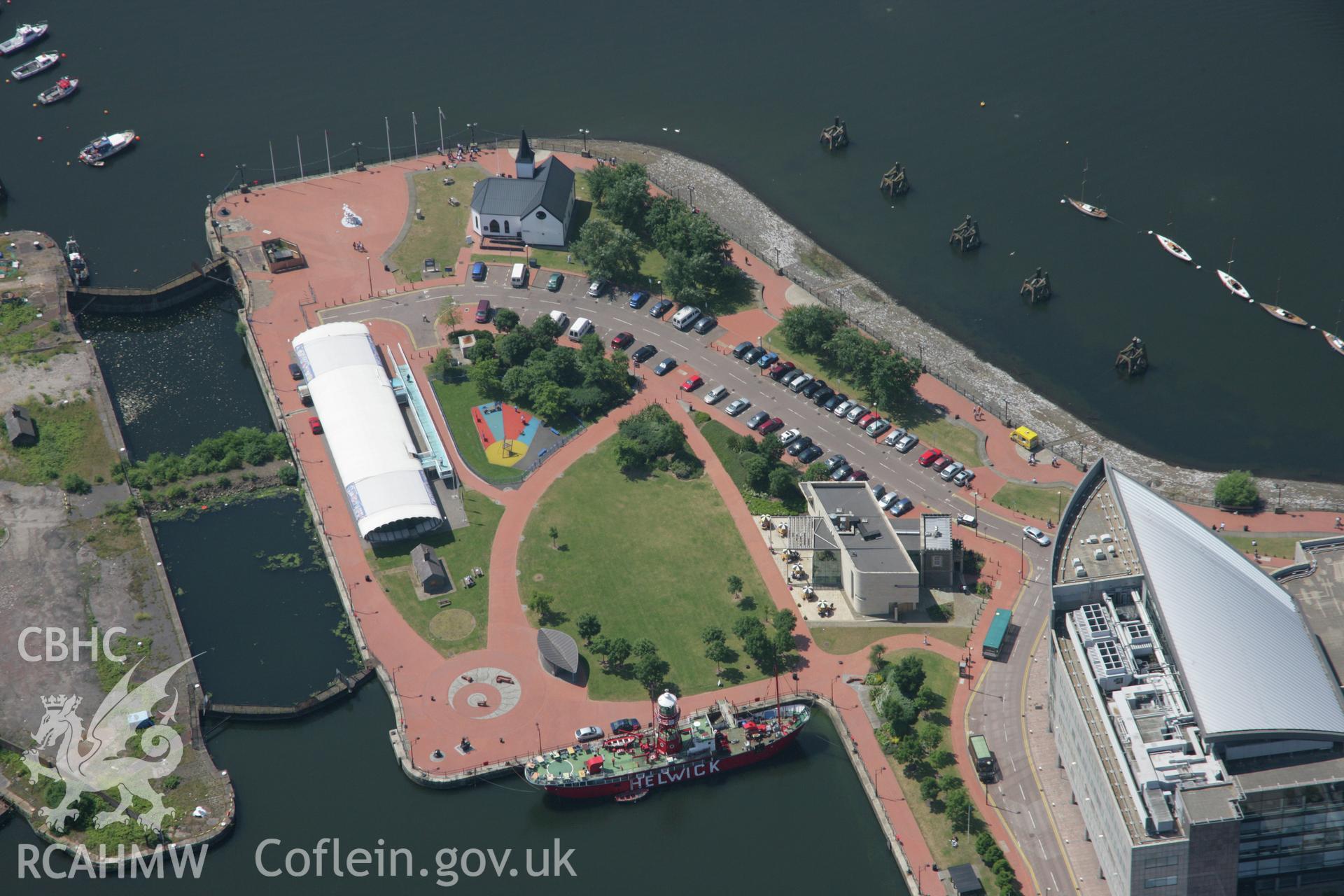RCAHMW colour oblique photograph of Cardiff Bay and Norweigan Church. Taken by Toby Driver on 29/06/2006.