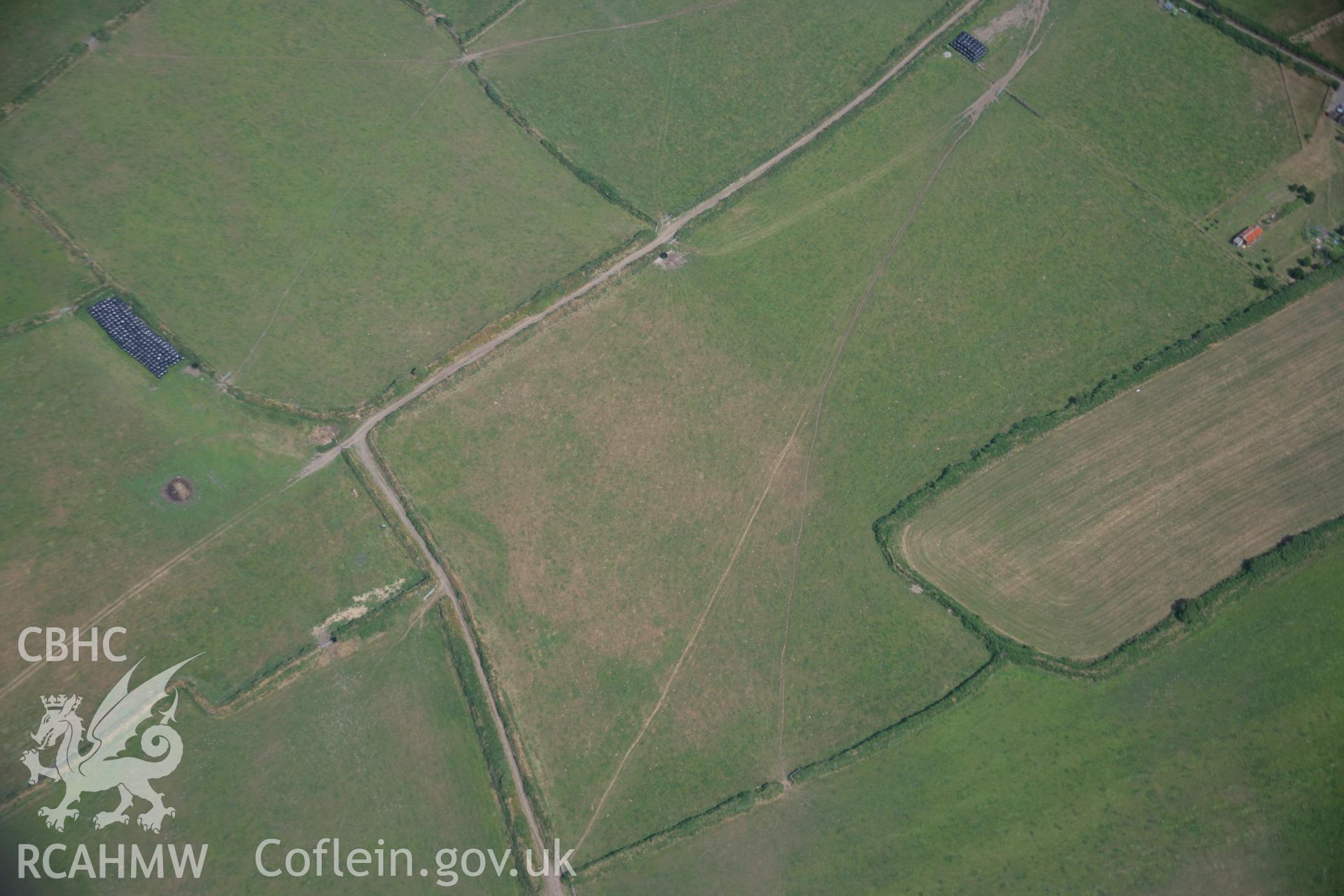 RCAHMW colour oblique aerial photograph of an enclosure at Cwmistir Uchaf. Taken on 25 July 2006 by Toby Driver