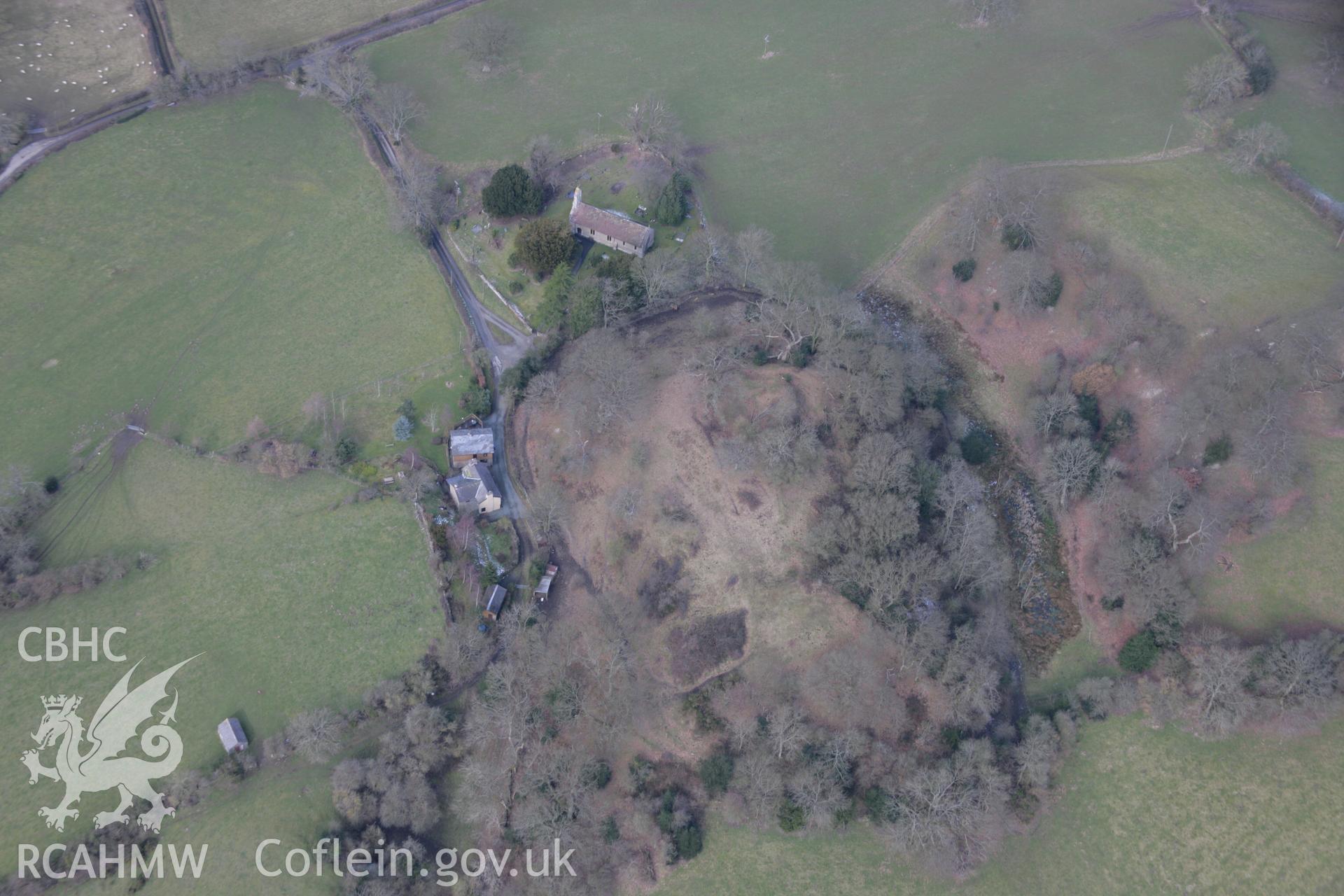 RCAHMW colour oblique aerial photograph of Hyssington Castle, motte and bailey, viewed from the south-east Taken on 06 March 2006 by Toby Driver.