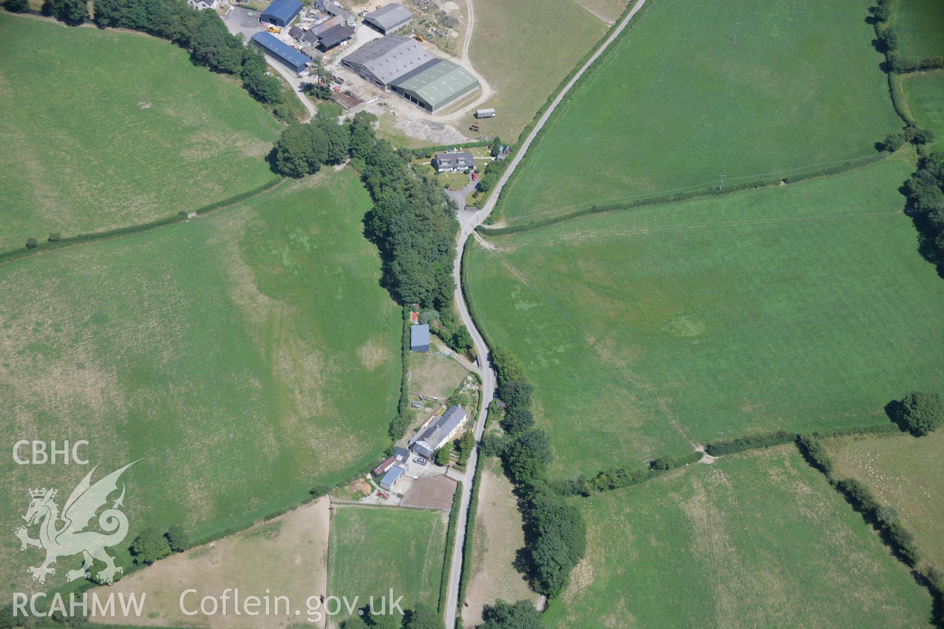 RCAHMW colour oblique aerial photograph of the cropmarks at Cyncoed that possibly represent an enclosure.. Taken on 17 July 2006 by Toby Driver.