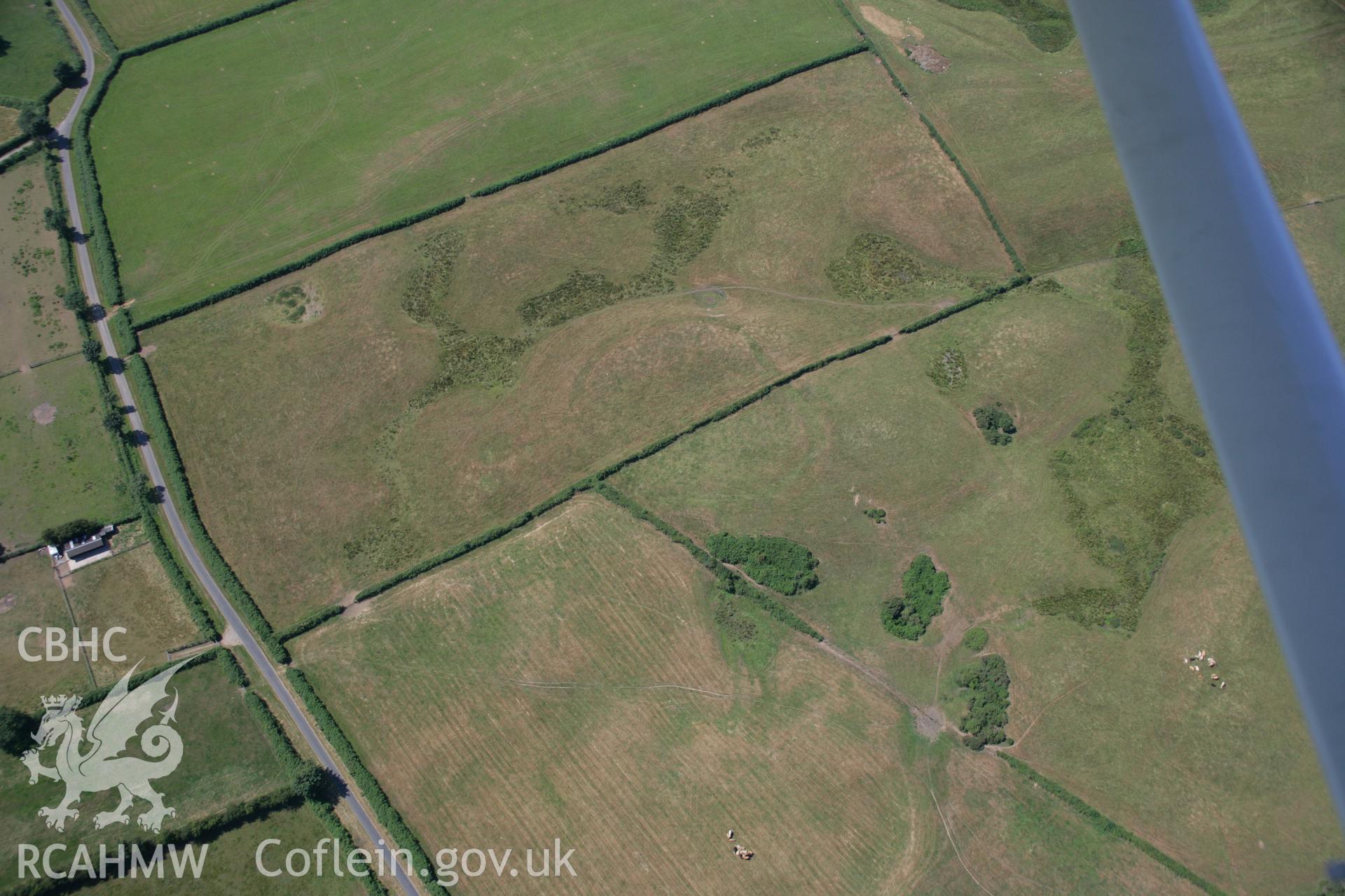 RCAHMW colour oblique aerial photograph of Mynydd-y-Fforest enclosure. Taken on 24 July 2006 by Toby Driver.