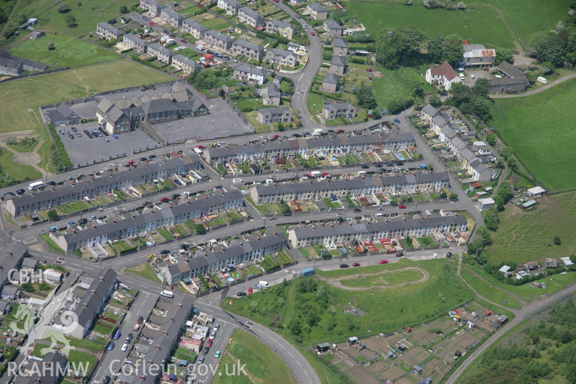 RCAHMW colour oblique aerial photograph of Phillip's Town, New Tredegar Town, viewed from the east. Taken on 09 June 2006 by Toby Driver.