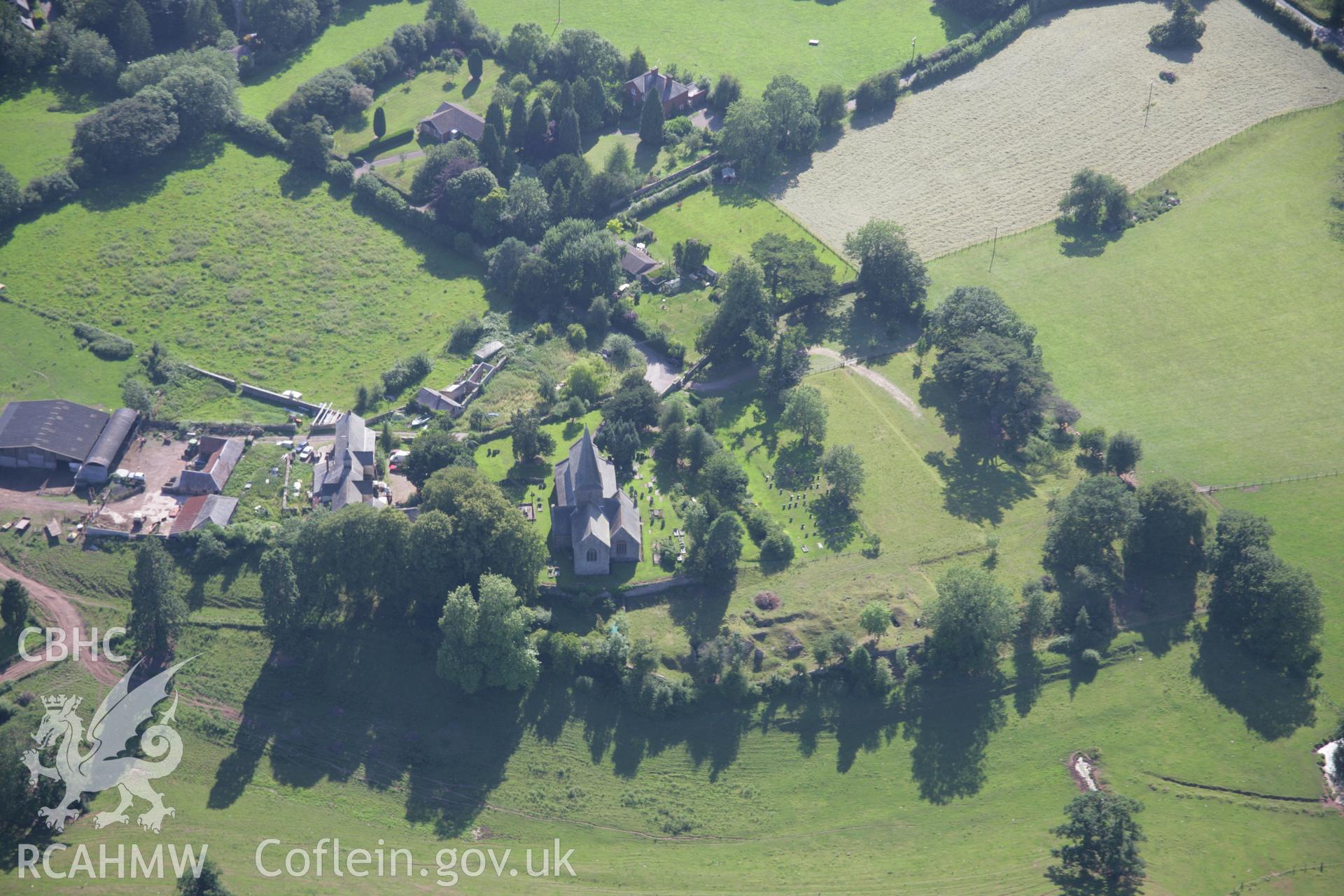 RCAHMW colour oblique aerial photograph of St Teilo's Church, Llantilio Crossenny. Taken on 13 July 2006 by Toby Driver.