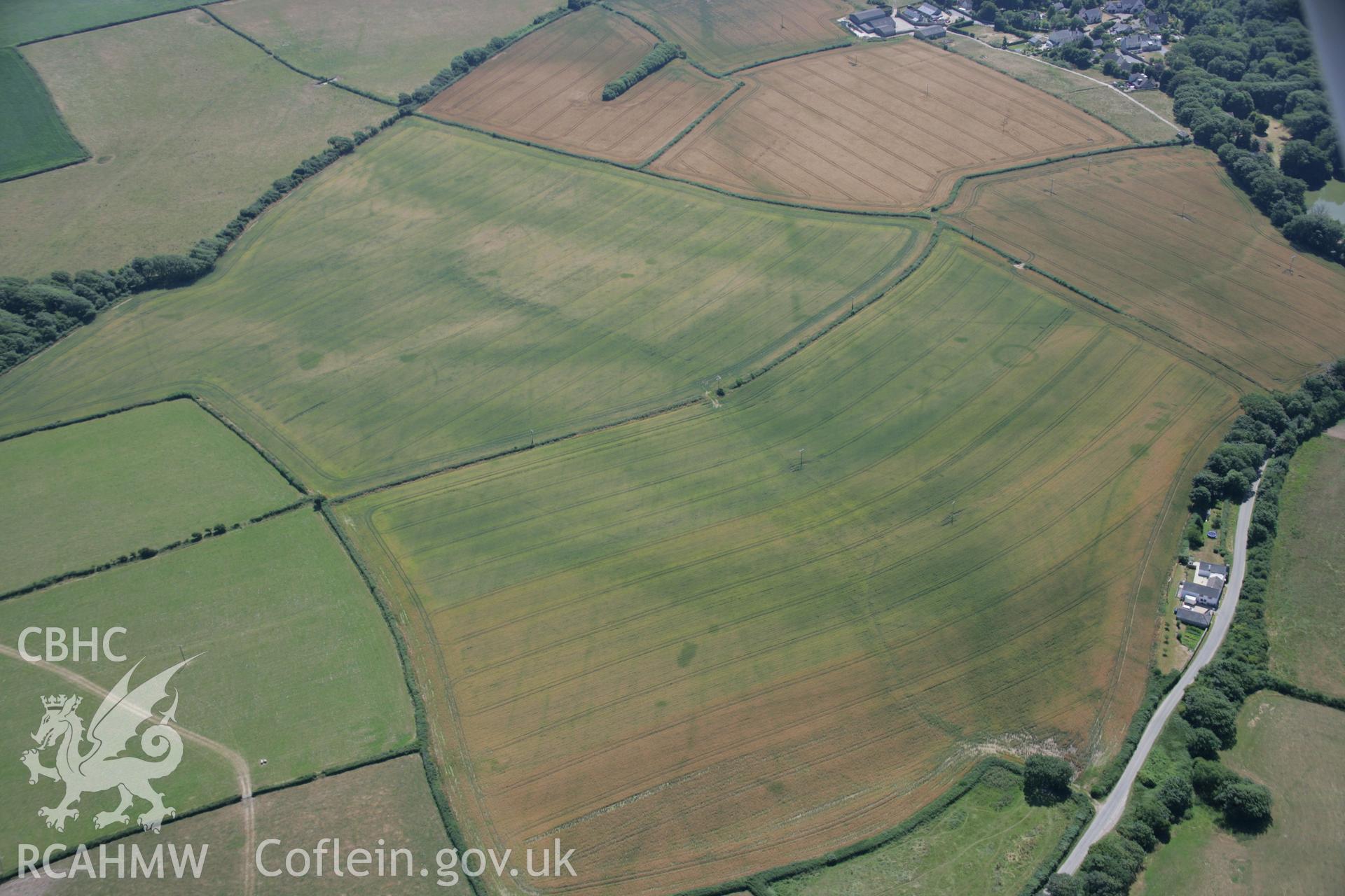 RCAHMW colour oblique aerial photograph of St Donat's Deserted Village. Taken on 24 July 2006 by Toby Driver.