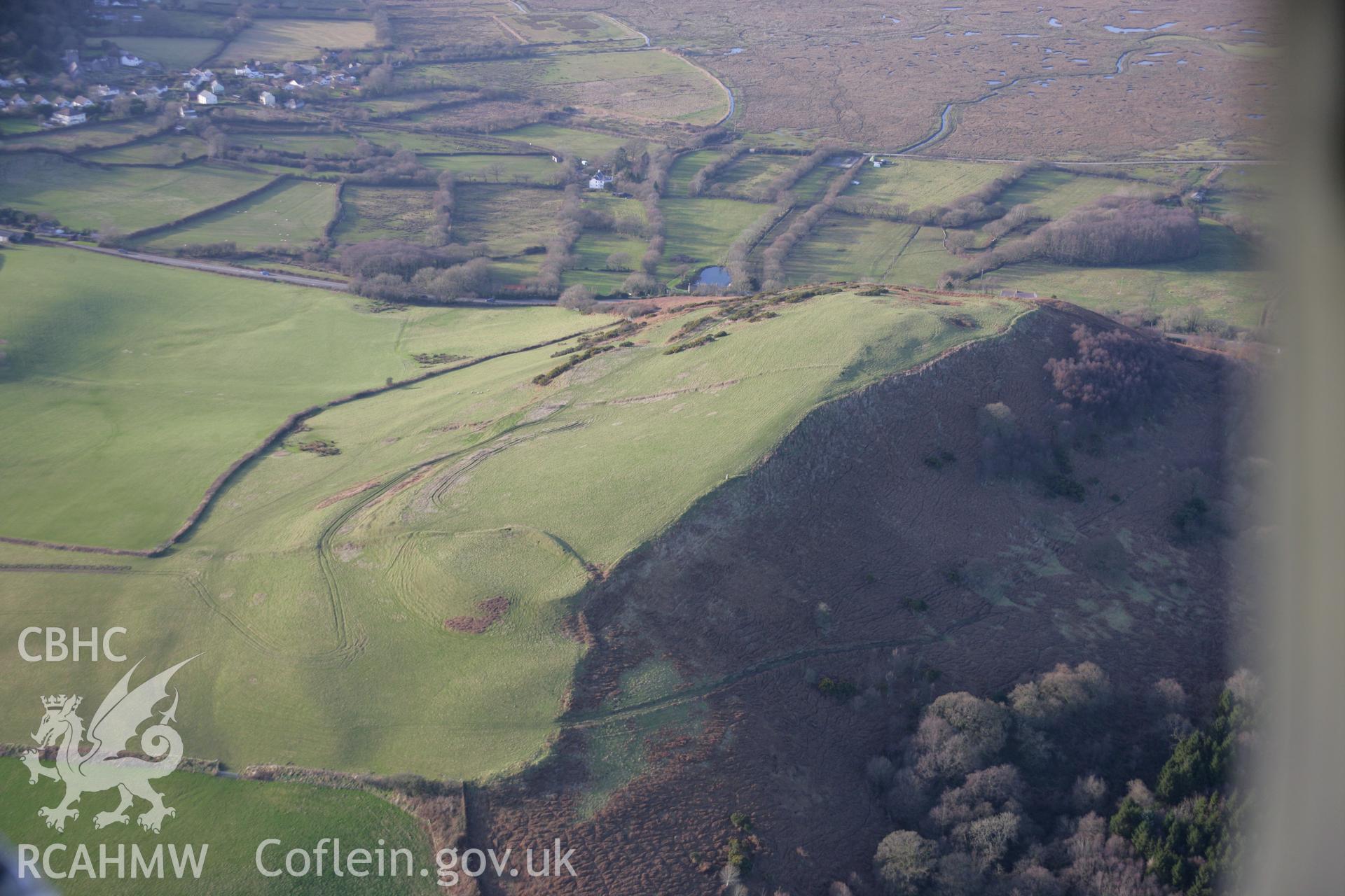 RCAHMW colour oblique aerial photograph of Cil Ifor Top Promontory Fortfrom the east. Taken on 26 January 2006 by Toby Driver.