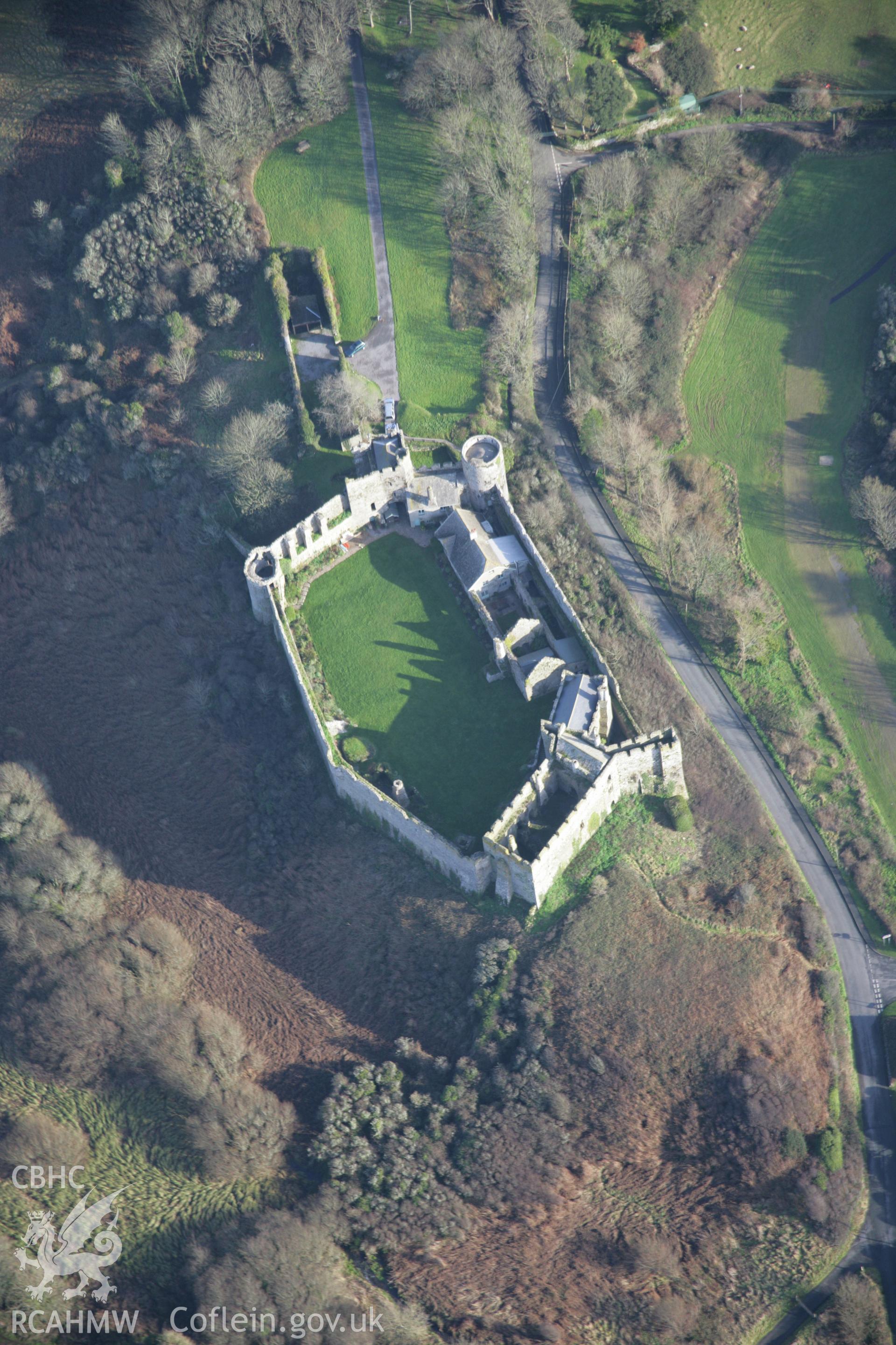 RCAHMW colour oblique aerial photograph of Manorbier Castle. Taken on 11 January 2006 by Toby Driver.