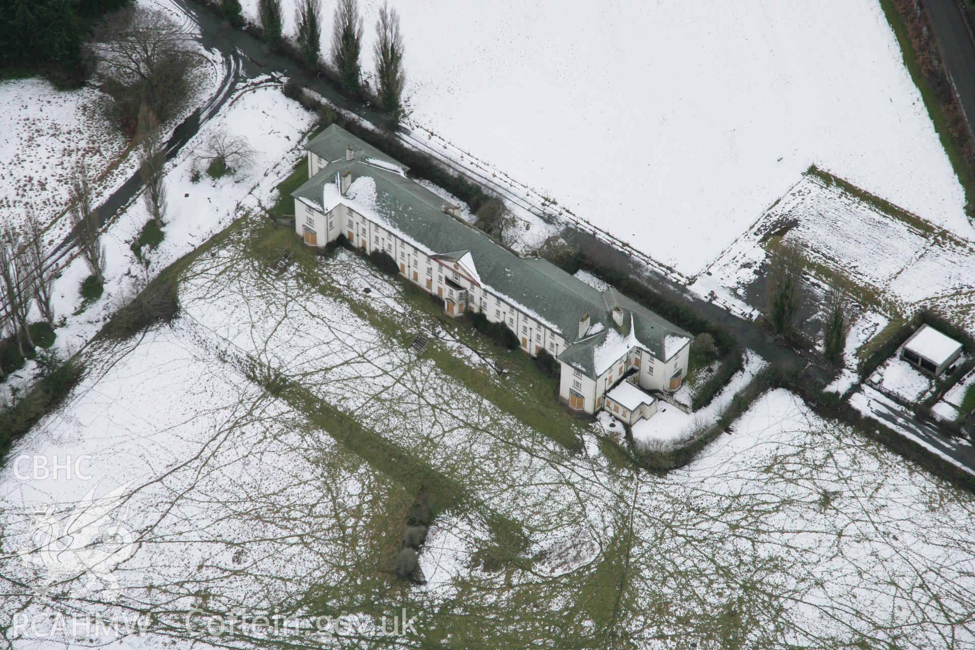 RCAHMW colour oblique aerial photograph of the nurses' home at North Wales Counties Mental Hospital from the east. Taken on 06 March 2006 by Toby Driver.