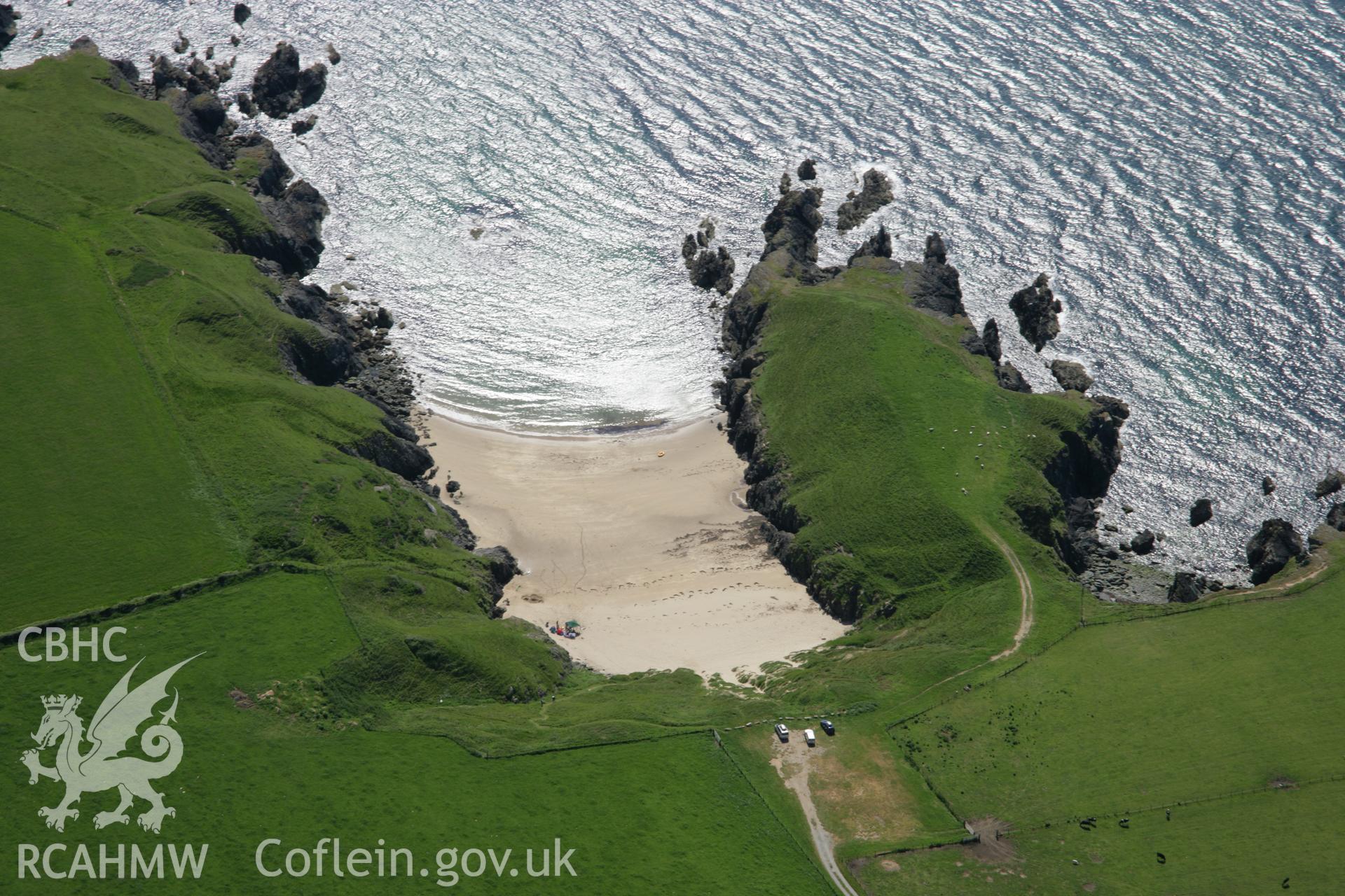 RCAHMW colour oblique aerial photograph of Dinas Promontory Fort from the north-east. Taken on 14 June 2006 by Toby Driver.