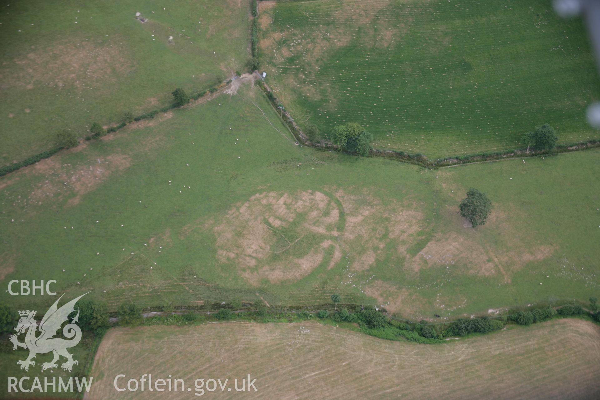 RCAHMW colour oblique aerial photograph of Llwyn-Bwch defended enclosure southwest. Taken on 27 July 2006 by Toby Driver.