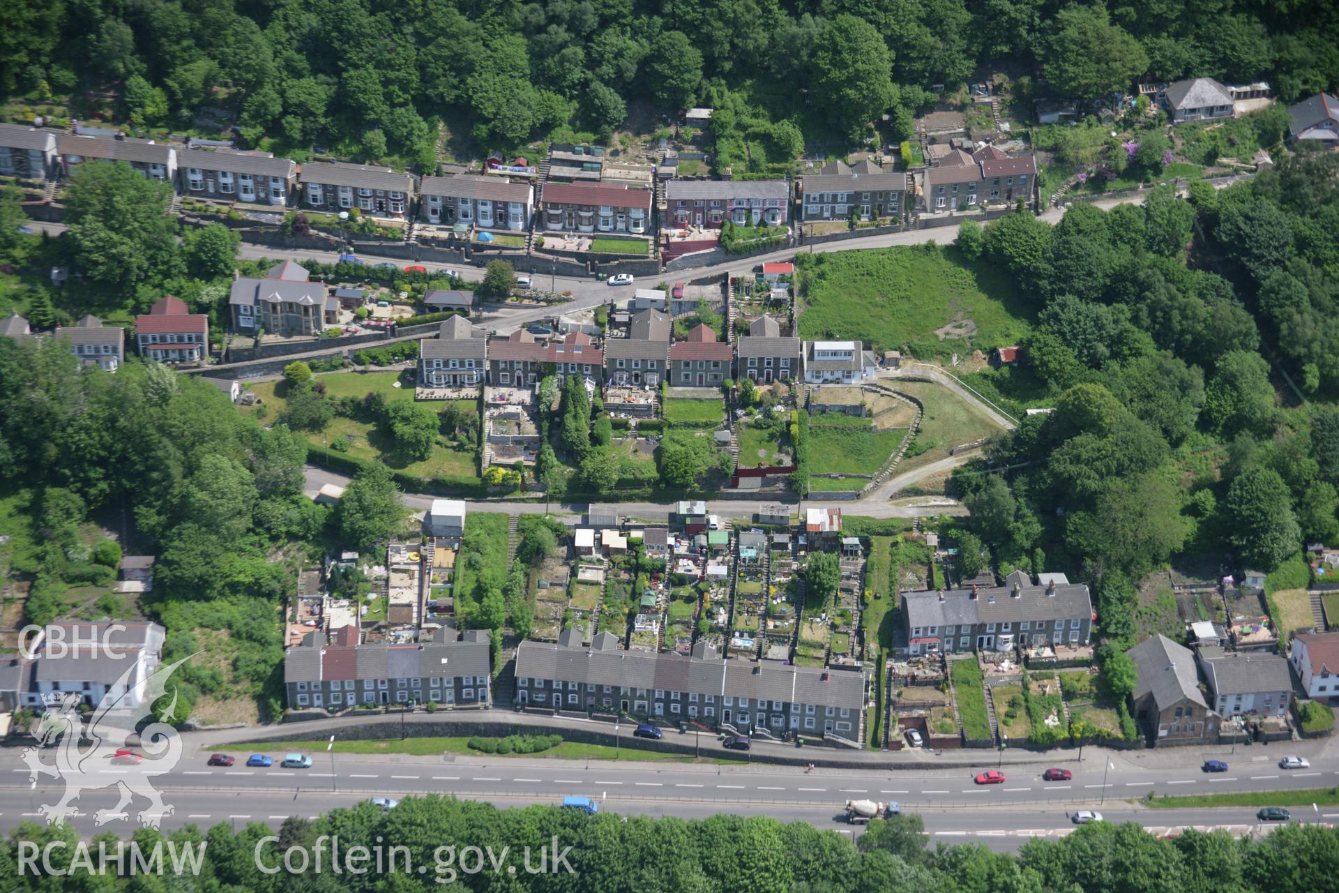 RCAHMW colour oblique aerial photograph of terraced housing south of cemetery, Abercarn. Taken on 09 June 2006 by Toby Driver