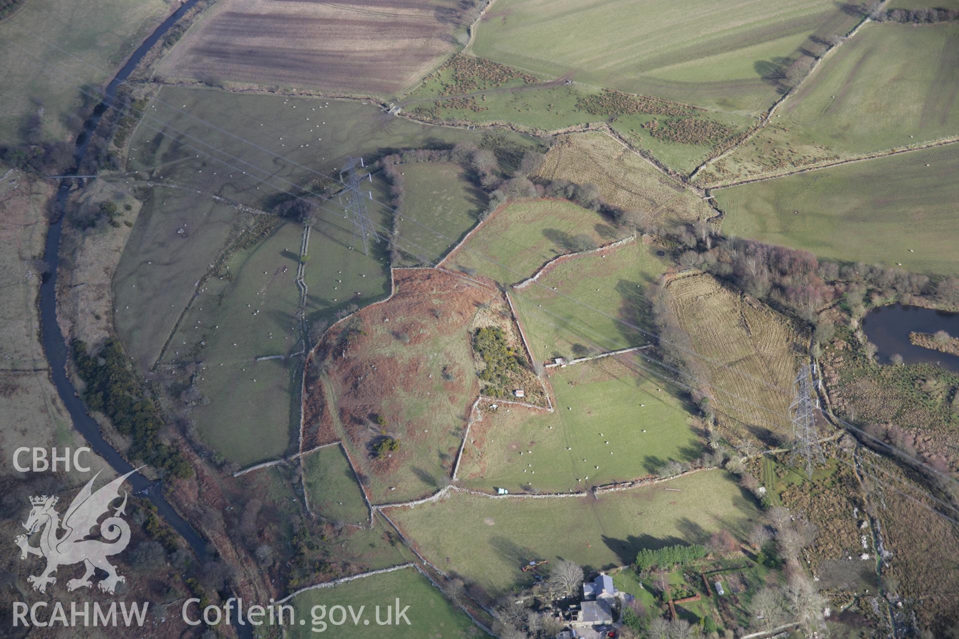 RCAHMW colour oblique aerial photograph of Caerengan from the west. Taken on 09 February 2006 by Toby Driver.