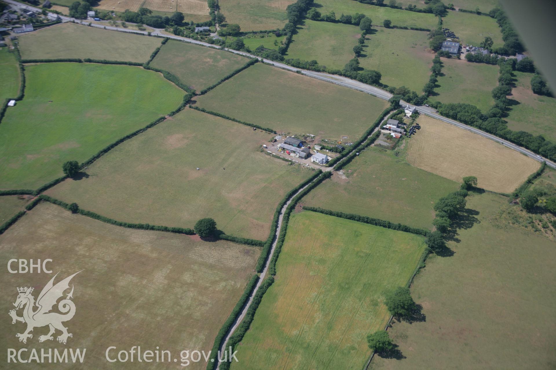 RCAHMW colour oblique aerial photograph of Fodol Defended Enclosure. Taken on 25 July 2006 by Toby Driver.