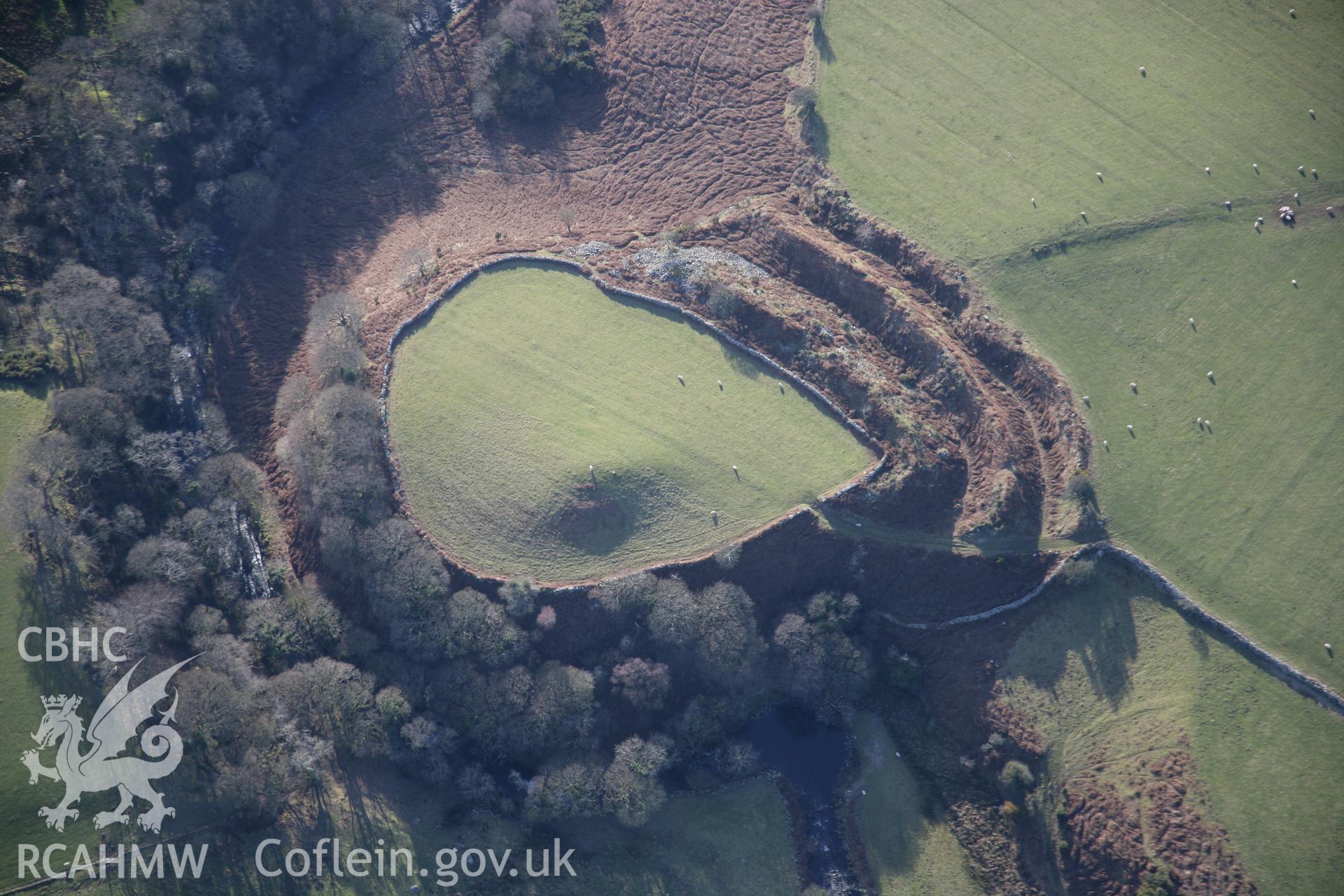 RCAHMW colour oblique aerial photograph of Craig-y-Dinas Camp from the north-east. Taken on 09 February 2006 by Toby Driver.