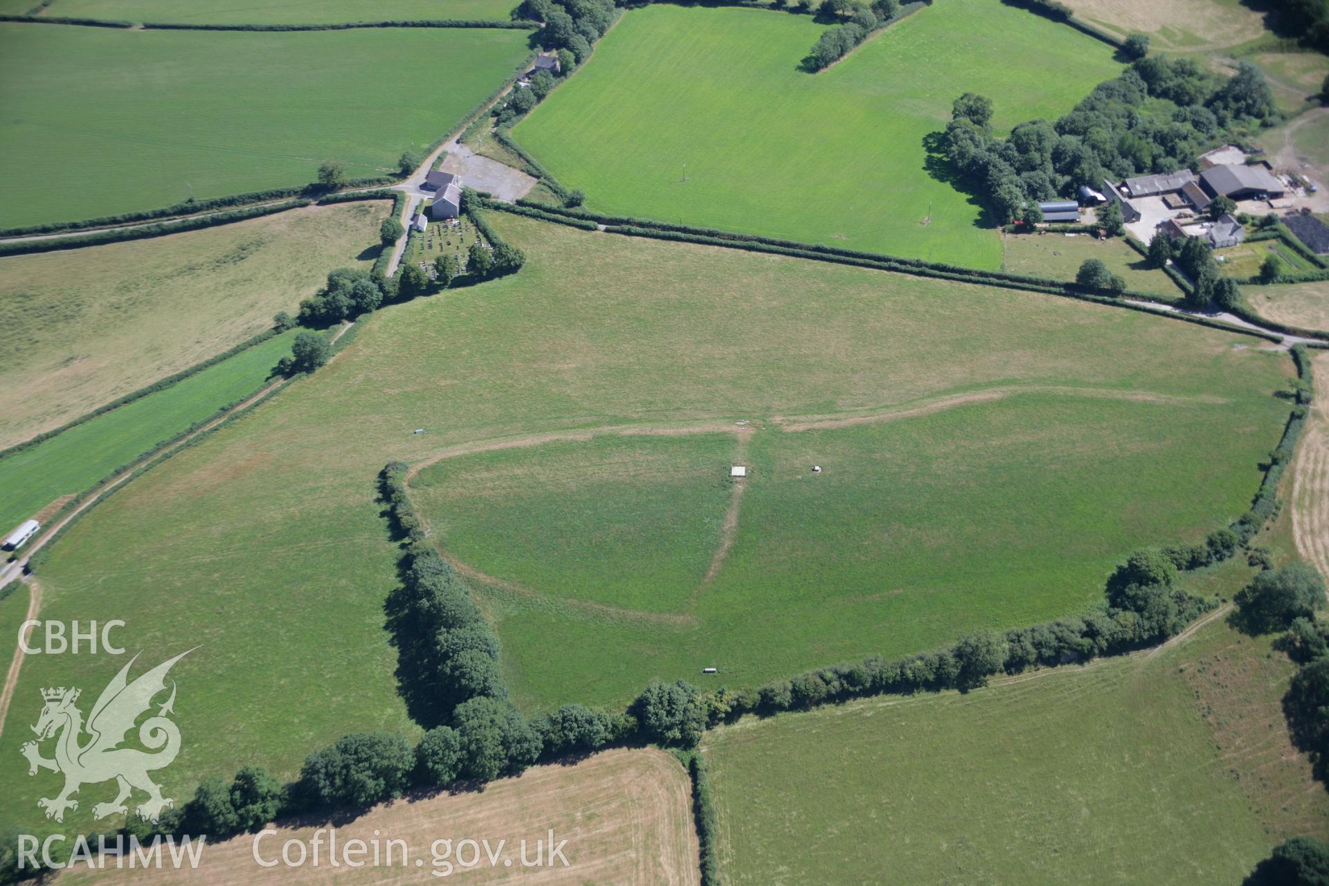 RCAHMW colour oblique aerial photograph of Pen-y-Gaer, Meidrim. Taken on 24 July 2006 by Toby Driver.