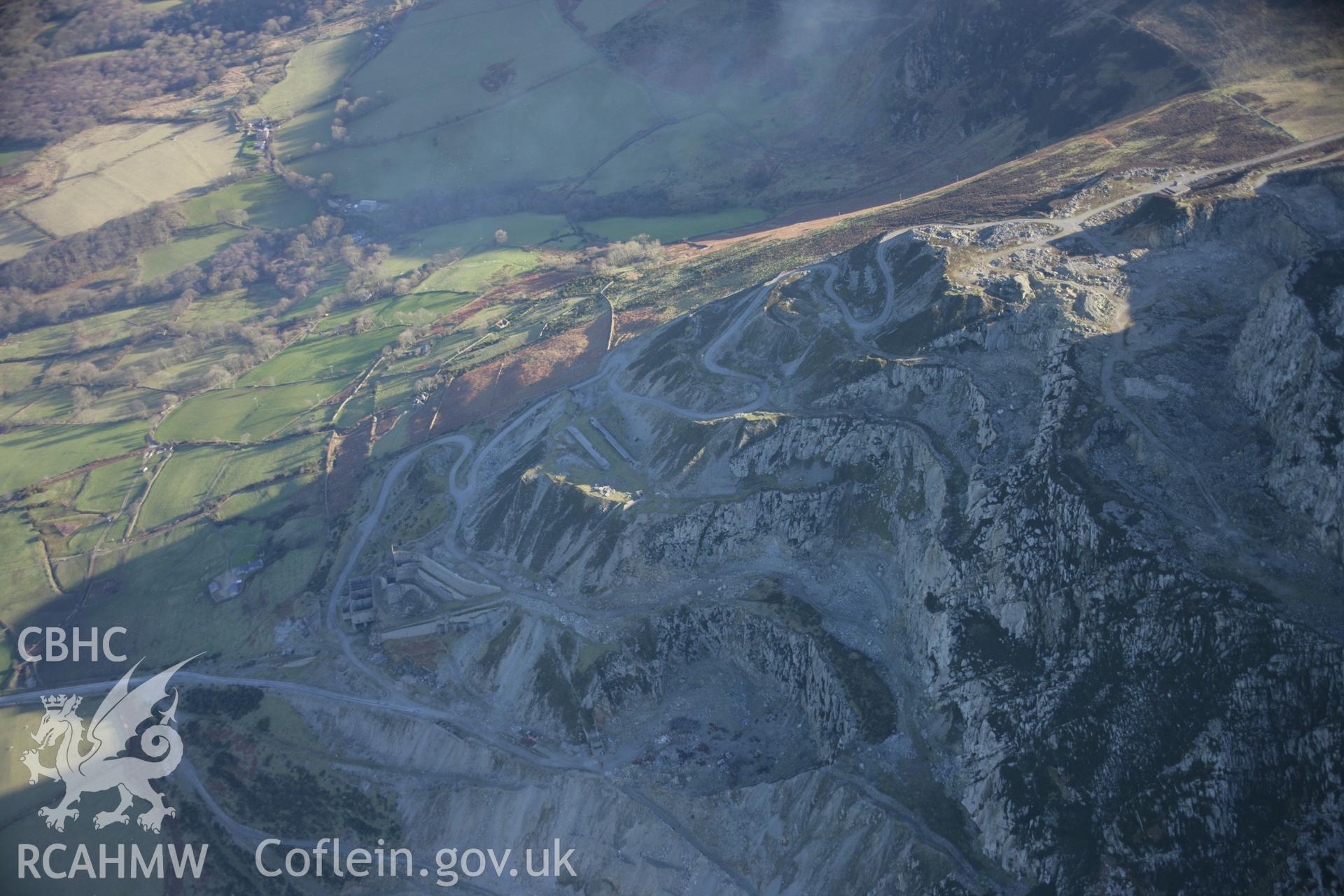 RCAHMW colour oblique aerial photograph of Yr Eifl Quarry from the west. Taken on 09 February 2006 by Toby Driver.