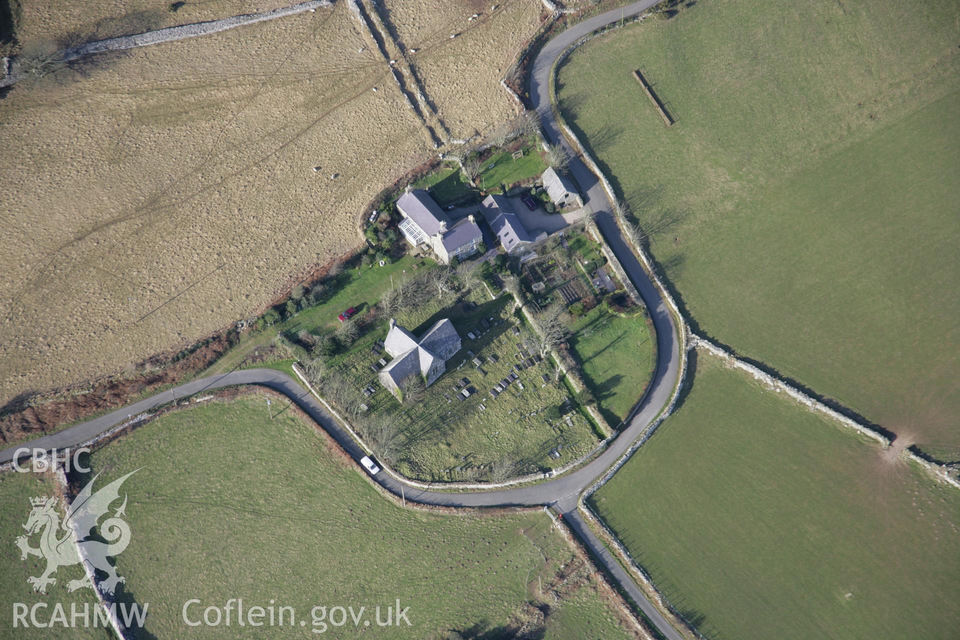 RCAHMW colour oblique aerial photograph of St Aelrhiw's Church, Rhiw, from the south-east. Taken on 09 February 2006 by Toby Driver.