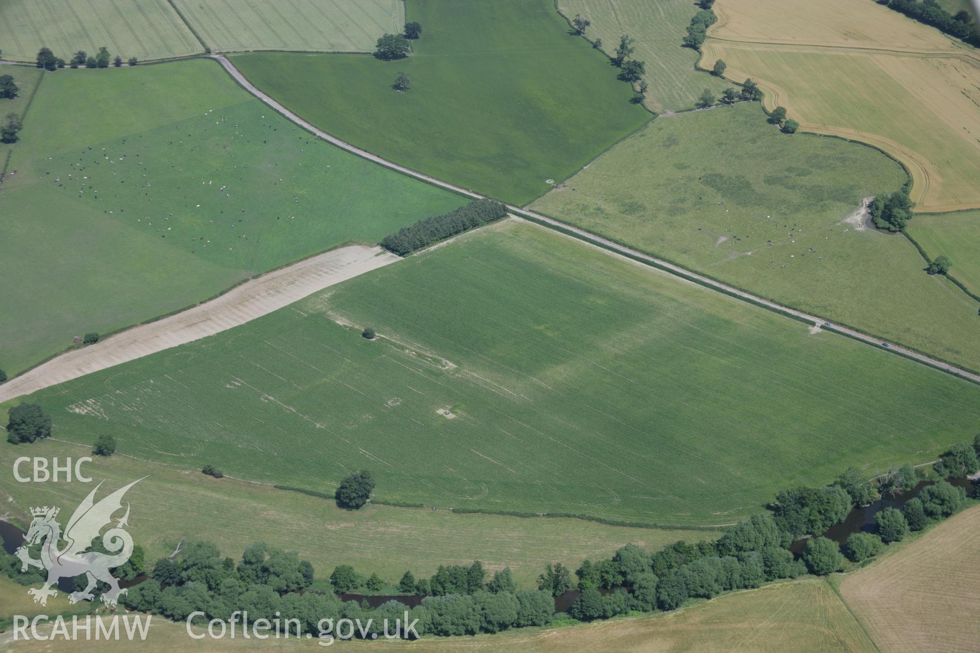 RCAHMW colour oblique aerial photograph of Forden Gaer Roman Settlement. Taken on 13 July 2006 by Toby Driver.