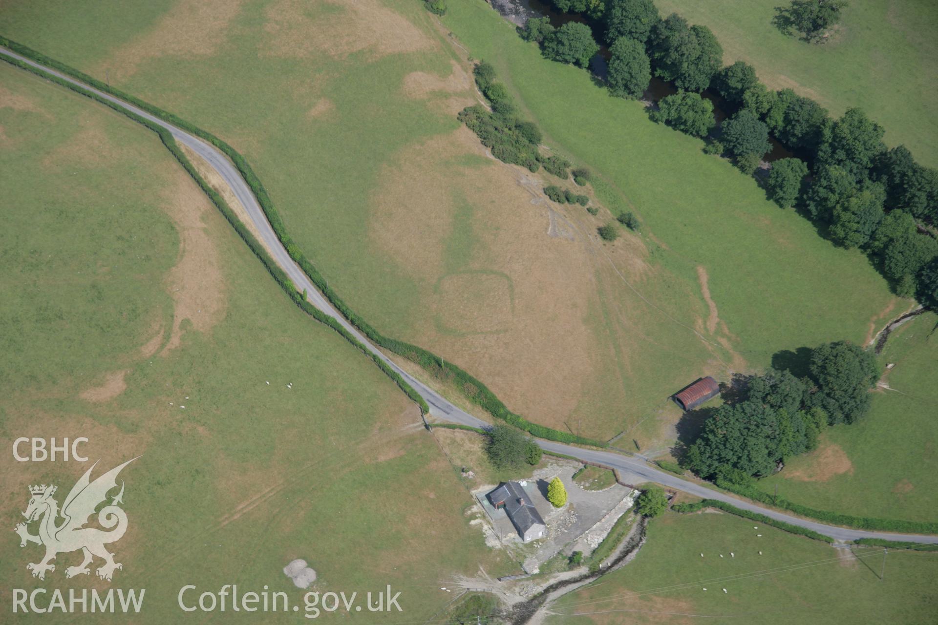 RCAHMW colour oblique aerial photograph of the Roman fortlet at Hafan. Taken on 25 July 2006 by Toby Driver.