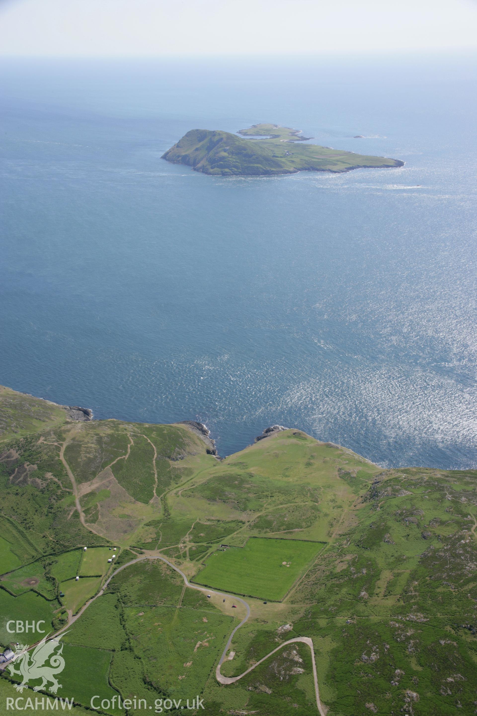 RCAHMW colour oblique aerial photograph of Bardsey Island (Ynys Enlli) from the north-east. Taken on 14 June 2006 by Toby Driver.