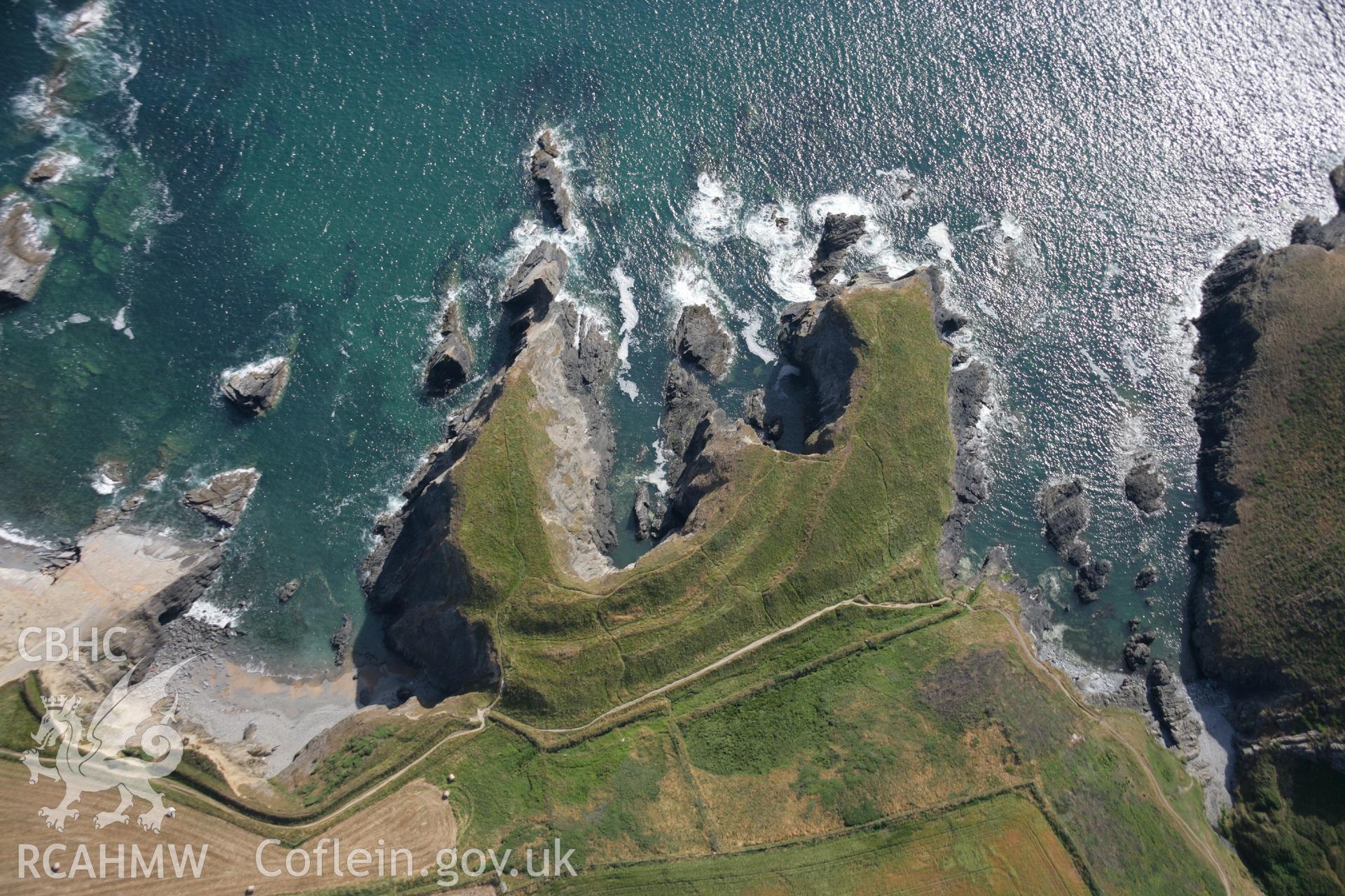 RCAHMW colour oblique aerial photograph of Porth-y-Rhaw Promontory Fort. Taken on 24 July 2006 by Toby Driver.