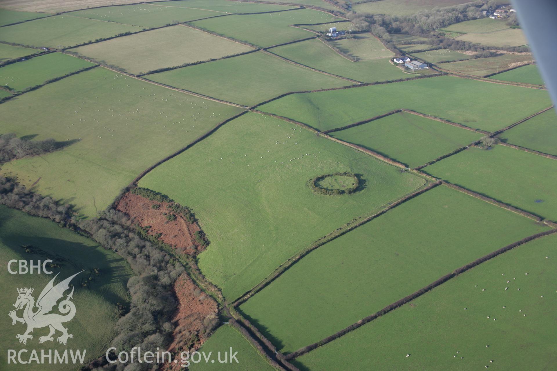 RCAHMW colour oblique aerial photograph of West Ford Rings from the south-east. Taken on 11 January 2006 by Toby Driver.