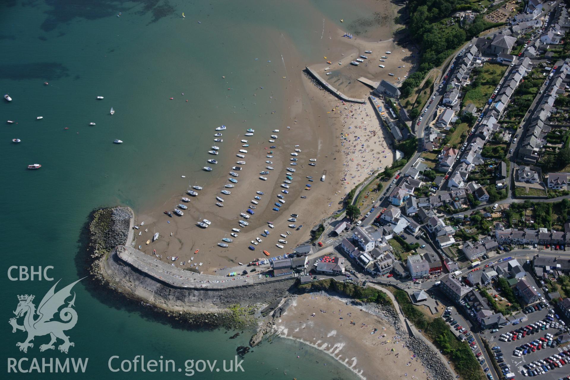 RCAHMW colour oblique aerial photograph of New Quay. Taken on 27 July 2006 by Toby Driver.