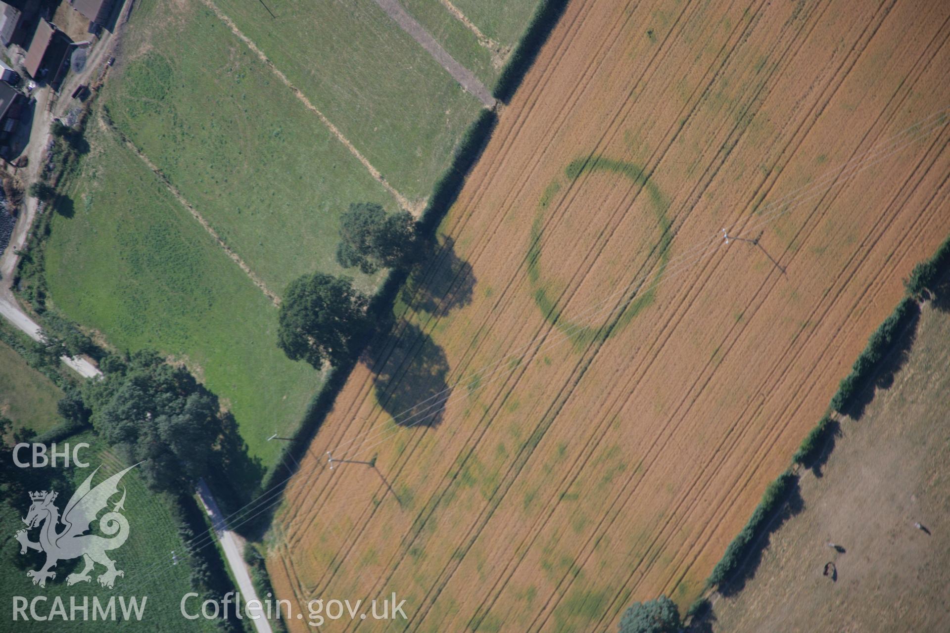 RCAHMW colour oblique aerial photograph of Four Crosses Barrow Cemetery, Site 7. Taken on 17 July 2006 by Toby Driver