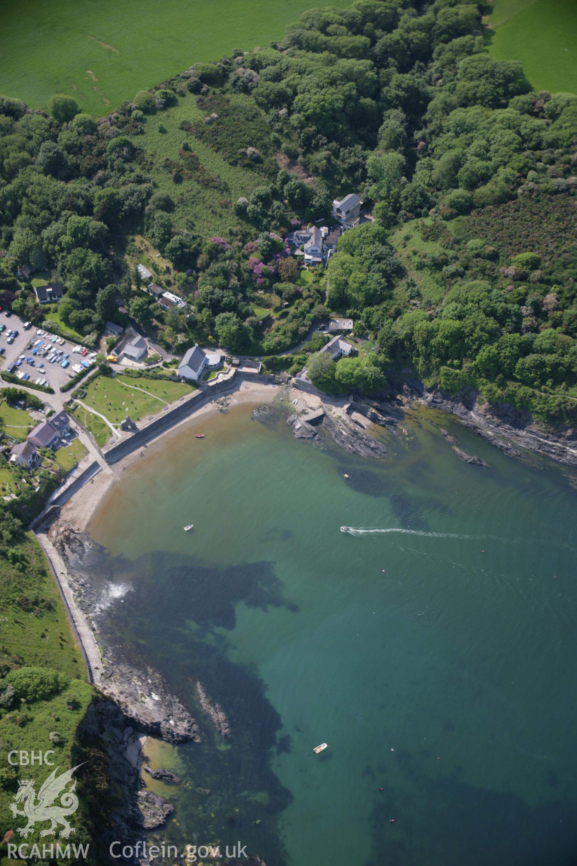 RCAHMW colour oblique aerial photograph of Cwm-Yr-Eglwys Harbour. Taken on 08 June 2006 by Toby Driver.