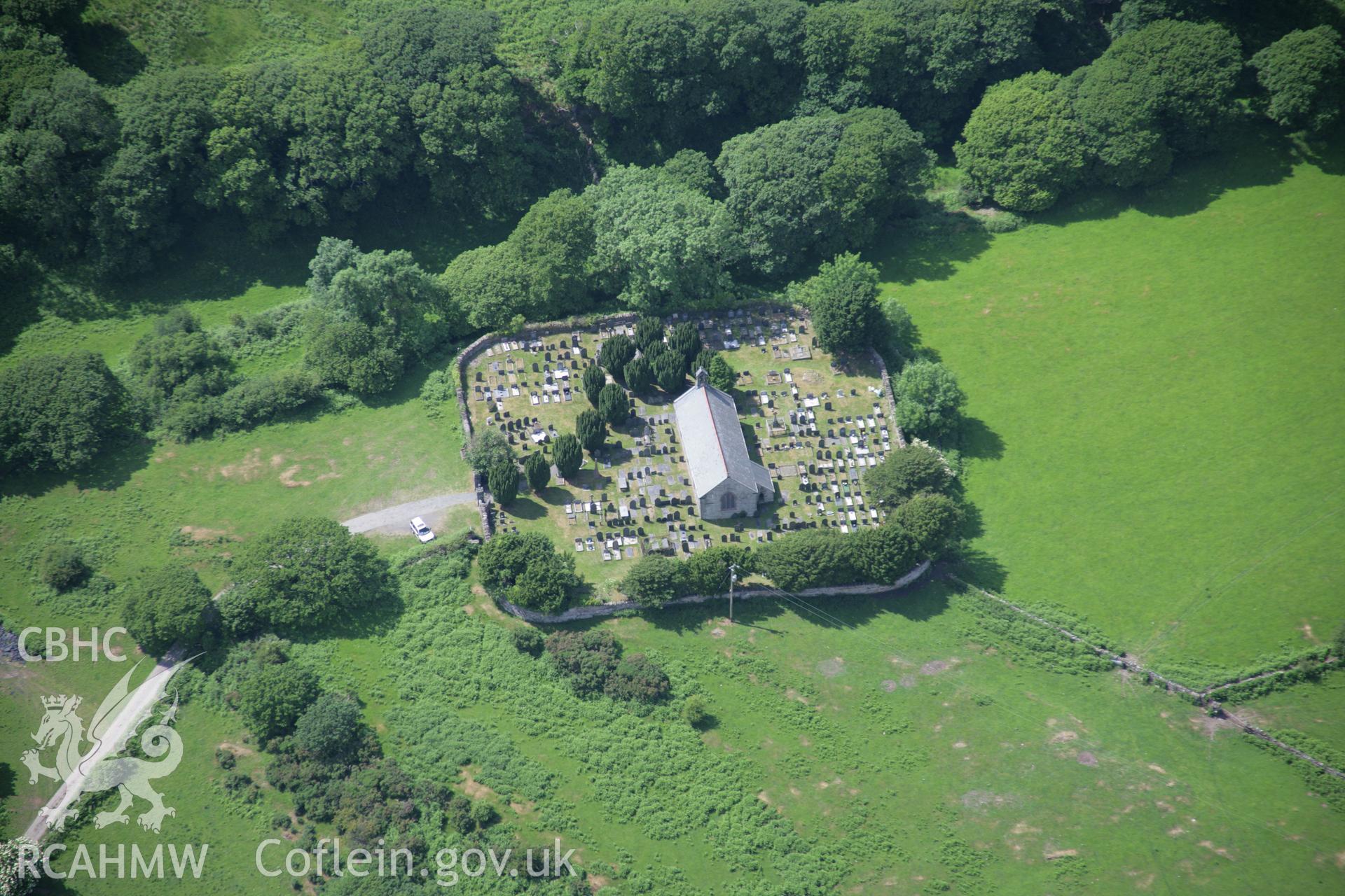 RCAHMW colour oblique aerial photograph of St Michaels Church, Llanfihangel-y-Traethau. From the south-east. Taken on 14 June 2006 by Toby Driver.