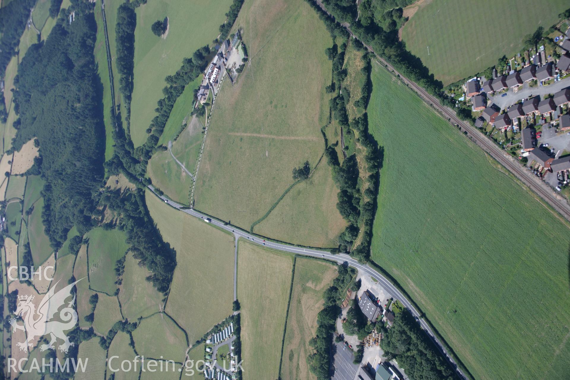 RCAHMW colour oblique aerial photograph of a Roman Road at Glanhafren. Taken on 17 July 2006 by Toby Driver.