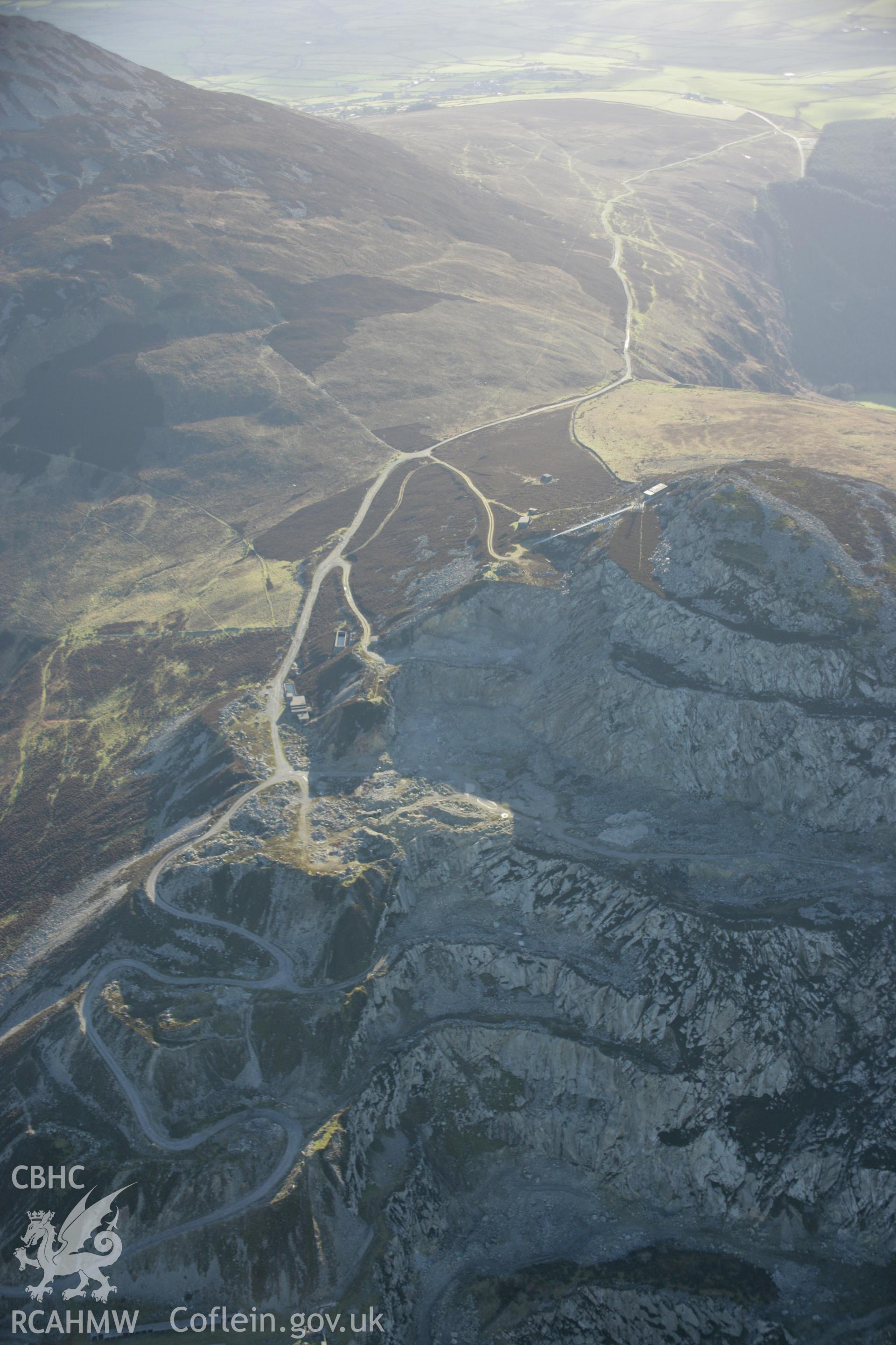 RCAHMW colour oblique aerial photograph of Yr Eifl Quarry from the north. Taken on 09 February 2006 by Toby Driver.