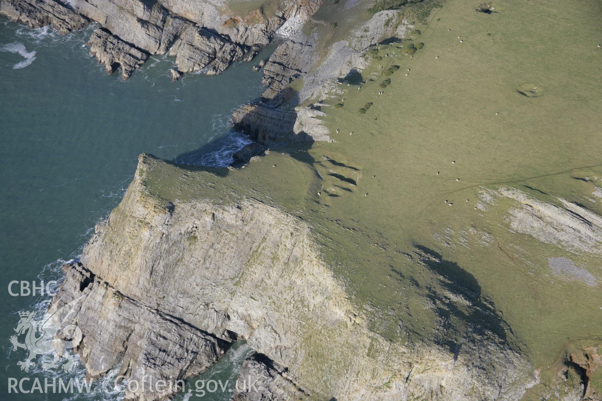 RCAHMW colour oblique aerial photograph of Horse Cliff Promontory Fort, viewed from the south. Taken on 26 January 2006 by Toby Driver.