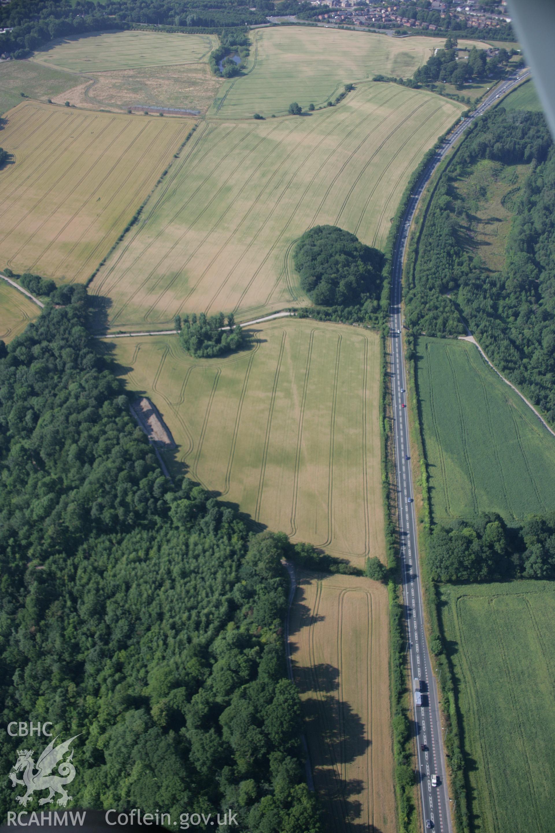 RCAHMW colour oblique aerial photograph of Darland Wood Barrow. Taken on 17 July 2006 by Toby Driver.