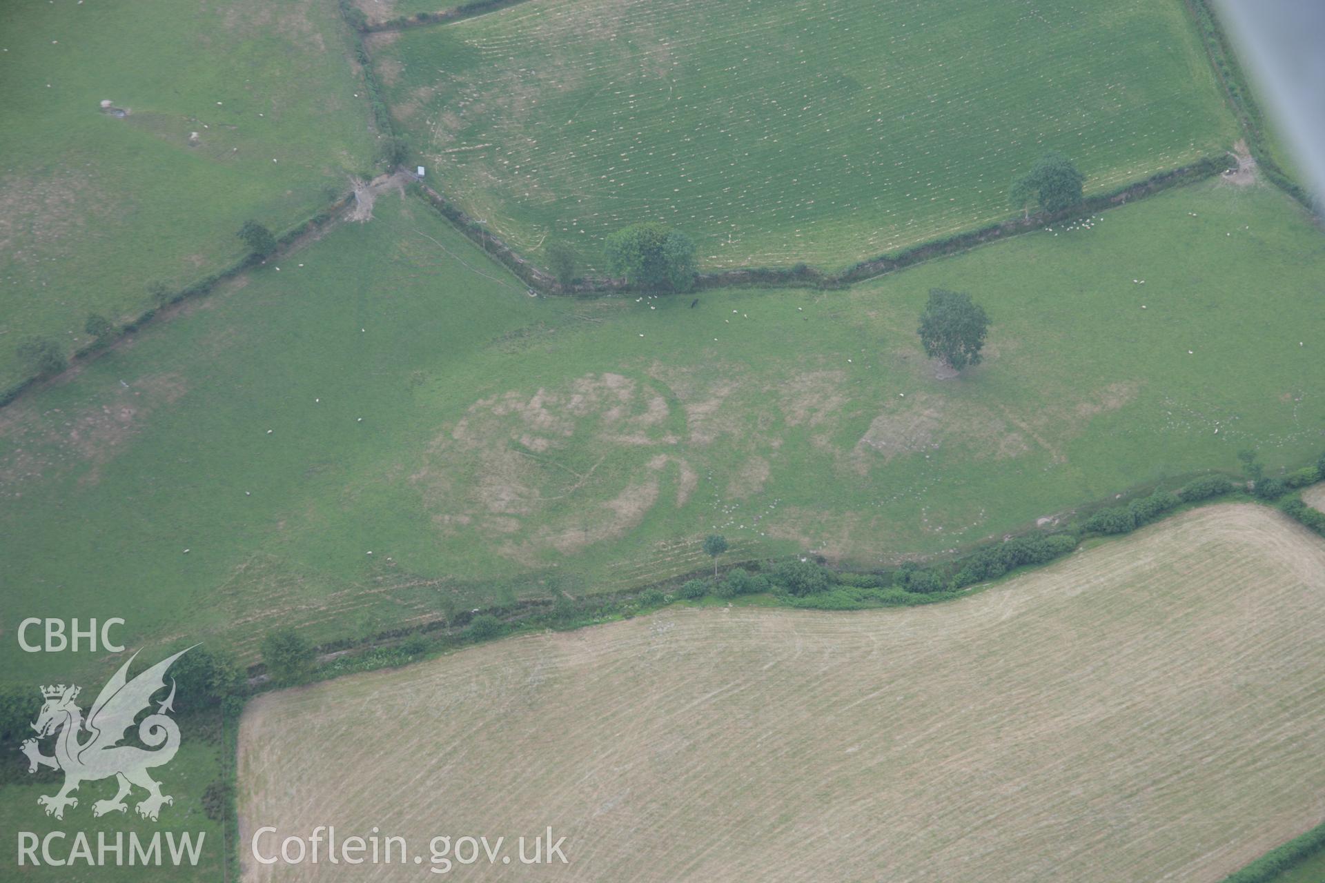 RCAHMW colour oblique aerial photograph of Llwyn-Bwch enclosure southwest. Taken on 21 July 2006 by Toby Driver.