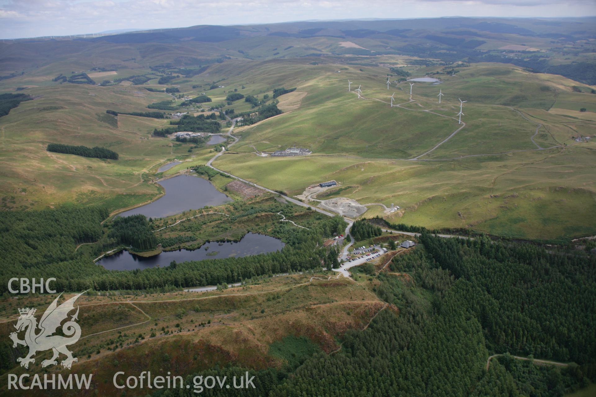 RCAHMW colour oblique aerial photograph of Bwlch Nant-yr-Arian Forest Visitor Centre. Taken on 27 July 2006 by Toby Driver.