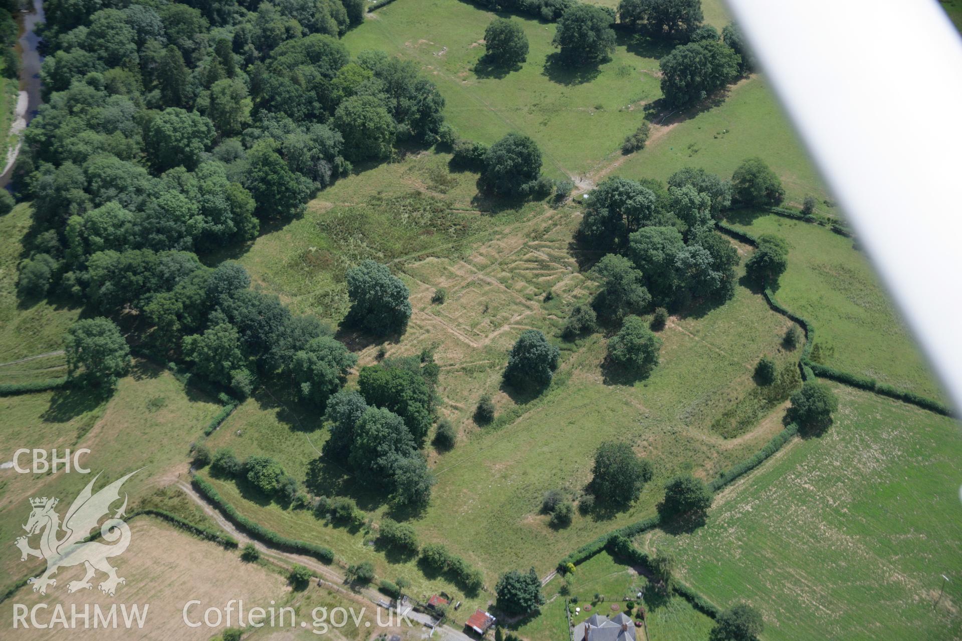 RCAHMW colour oblique aerial photograph of Castell Collen Roman Fort. Taken on 27 July 2006 by Toby Driver.