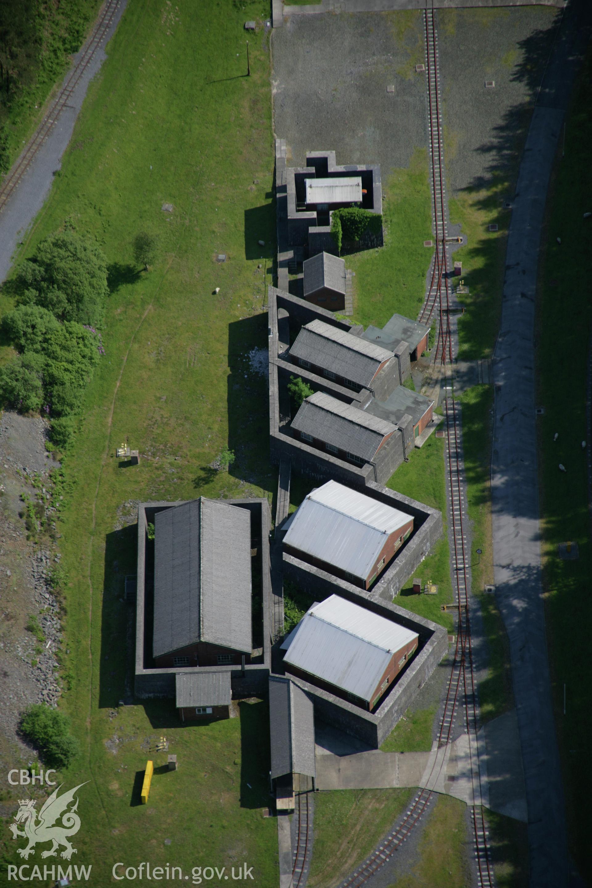 RCAHMW colour oblique aerial photograph of RNAD Trecwn from the north showing bunkers in the northern valley.. Taken on 08 June 2006 by Toby Driver.