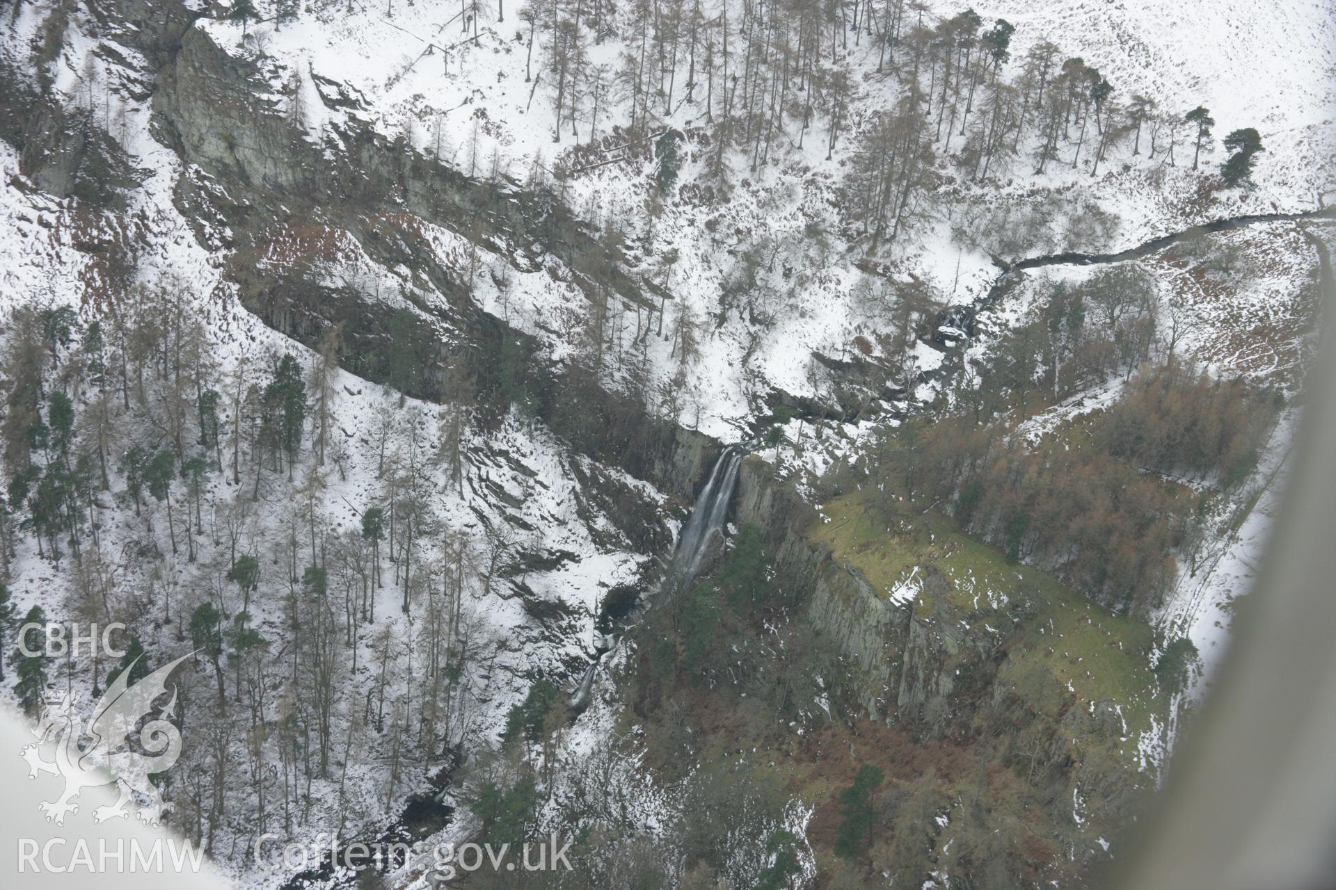 RCAHMW colour oblique aerial photograph of Pistyll Rhaeadr Waterfall and Walks, viewed from the east. Taken on 06 March 2006 by Toby Driver.
