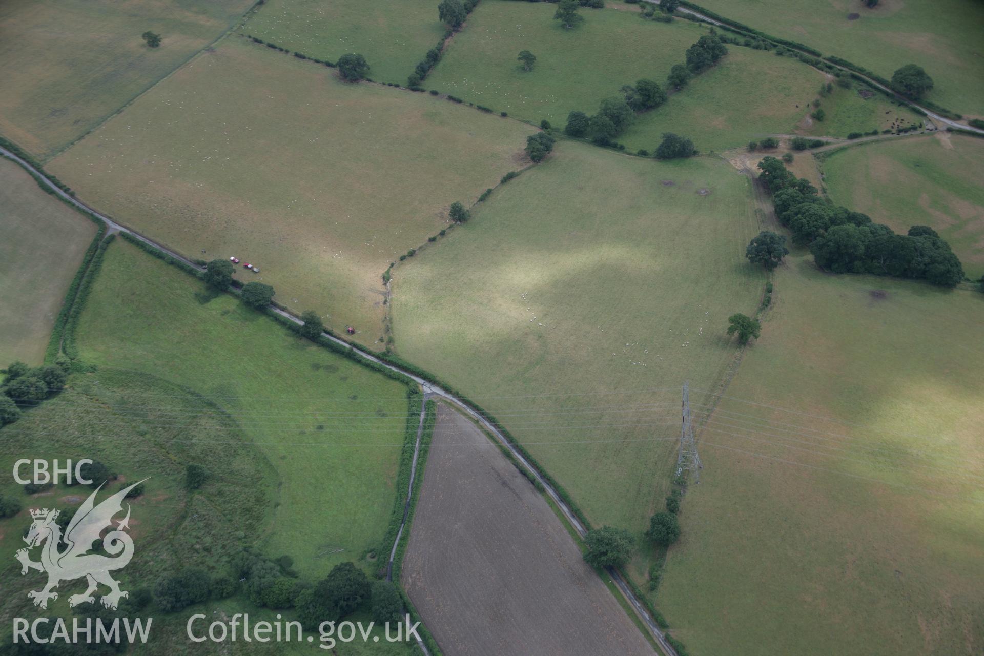RCAHMW colour oblique aerial photograph of Ty'n-y-Wern Hillfort. Taken on 31 July 2006 by Toby Driver.