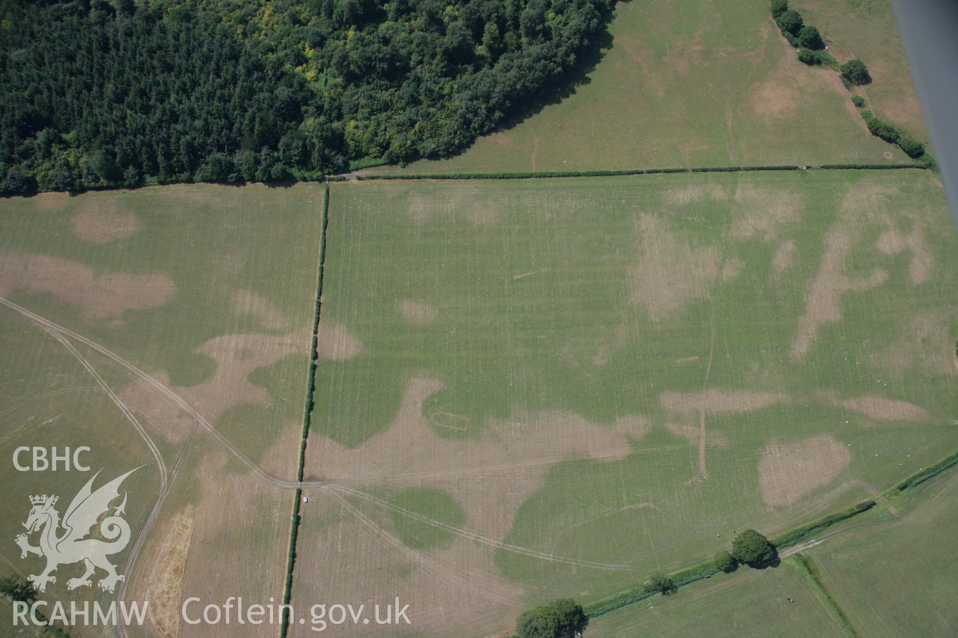 RCAHMW colour oblique aerial photograph of Llwydfaen Church. Taken on 25 July 2006 by Toby Driver.