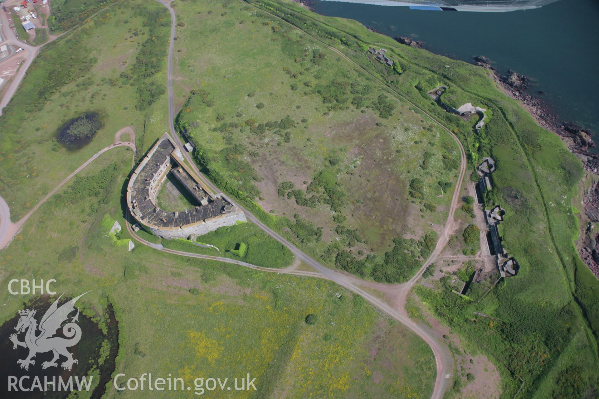 RCAHMW colour oblique aerial photograph of South Hook Fort from the north-west. Taken on 08 June 2006 by Toby Driver.