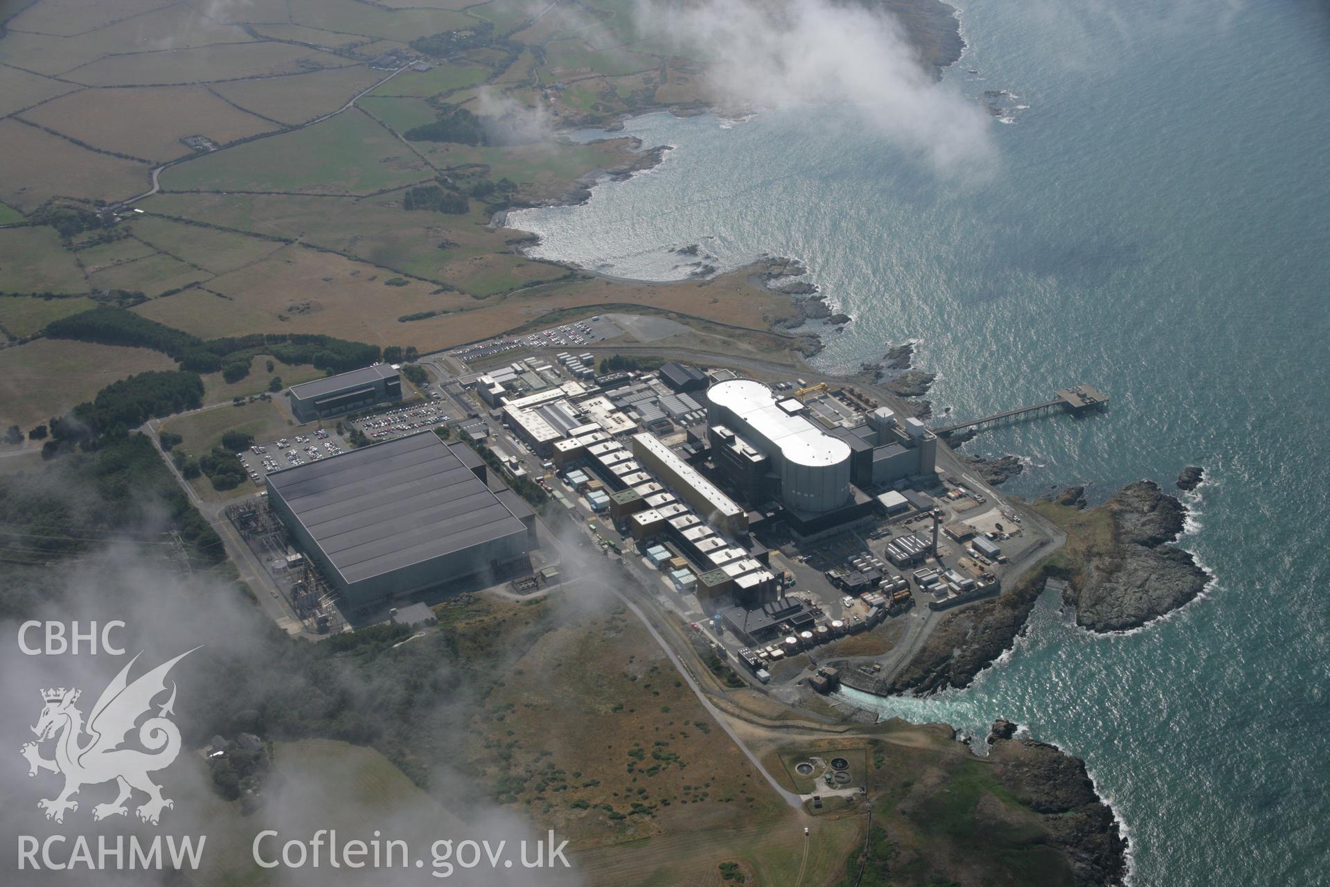 RCAHMW colour oblique aerial photograph of Wylfa Nuclear Power Station. Taken on 14 August 2006 by Toby Driver.