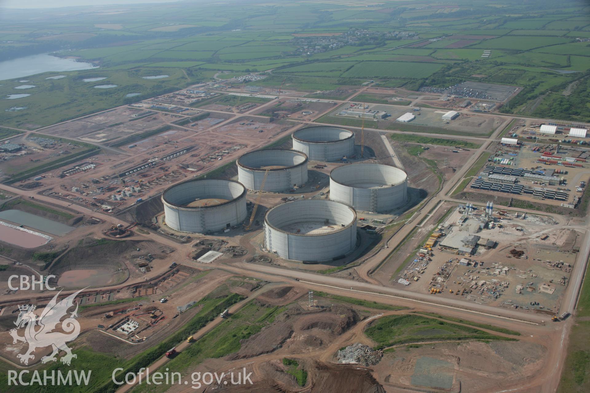 RCAHMW colour oblique aerial photograph of Esso South Hook Oil Refinery and liquid natural gas facility, Milford Haven, from the south-east. Taken on 08 June 2006 by Toby Driver.