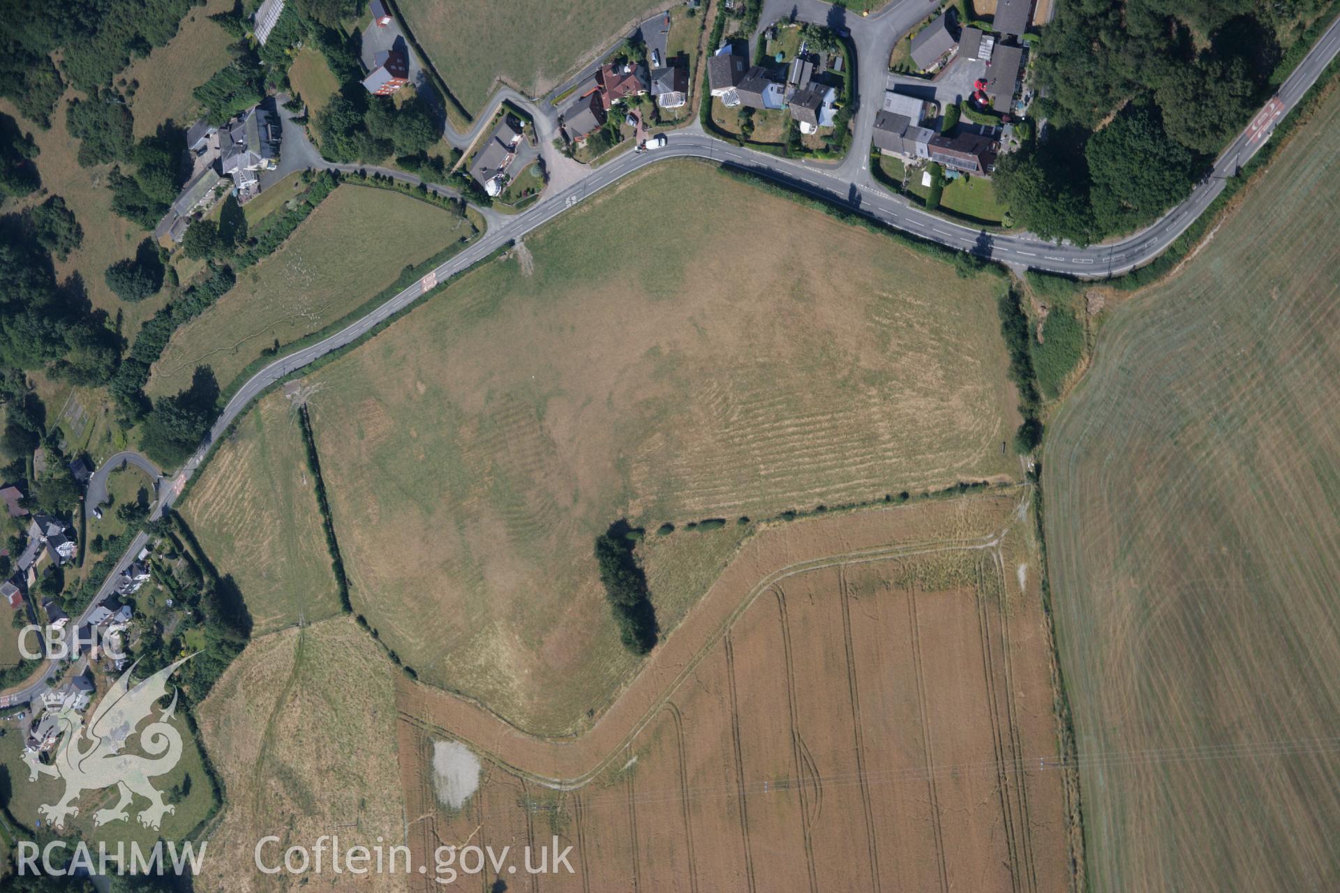 RCAHMW colour oblique aerial photograph of Pentre Round Barrow. Taken on 17 July 2006 by Toby Driver.