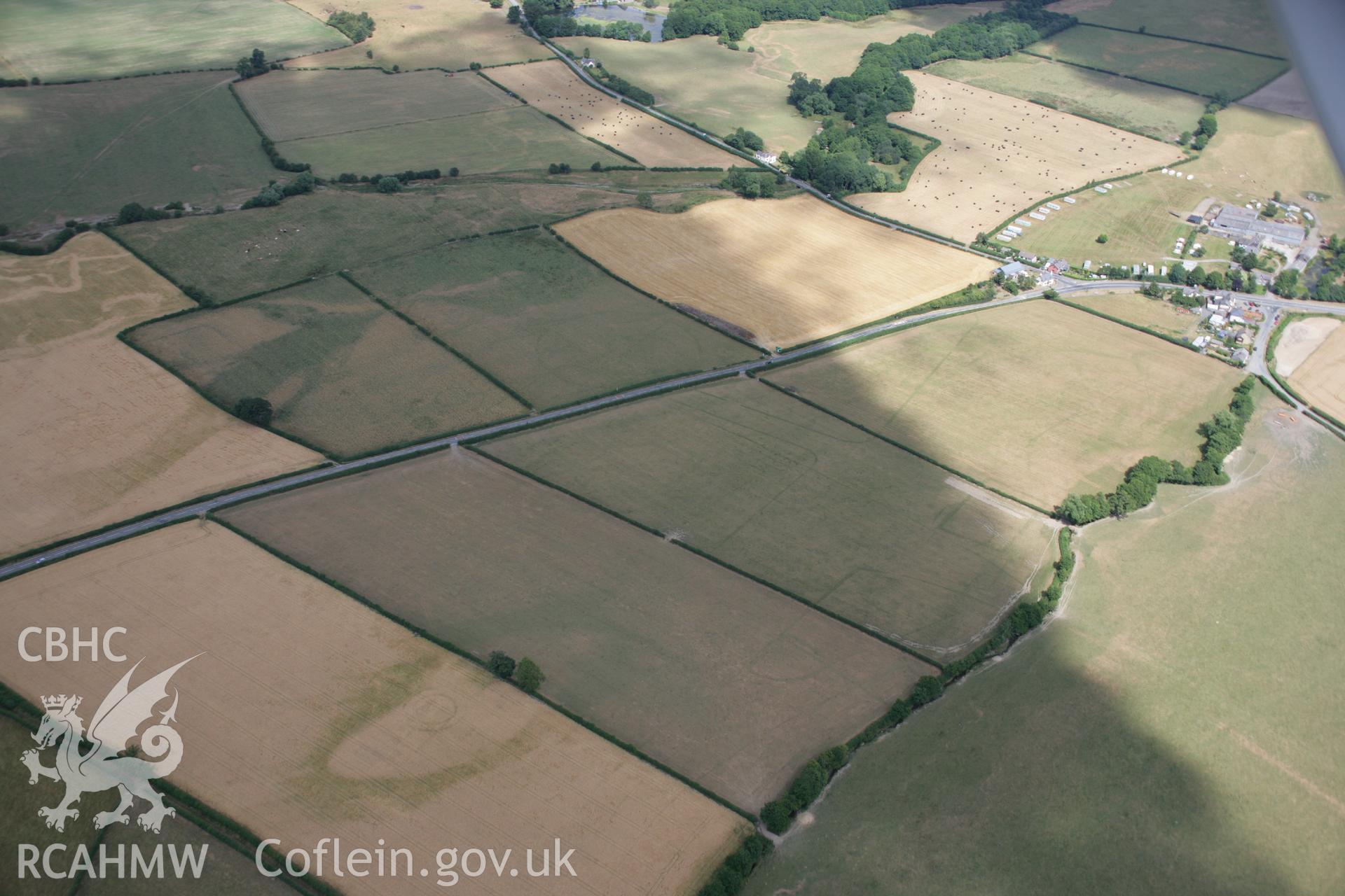 RCAHMW colour oblique aerial photograph of Walton Roman Camps II and III. Taken on 27 July 2006 by Toby Driver