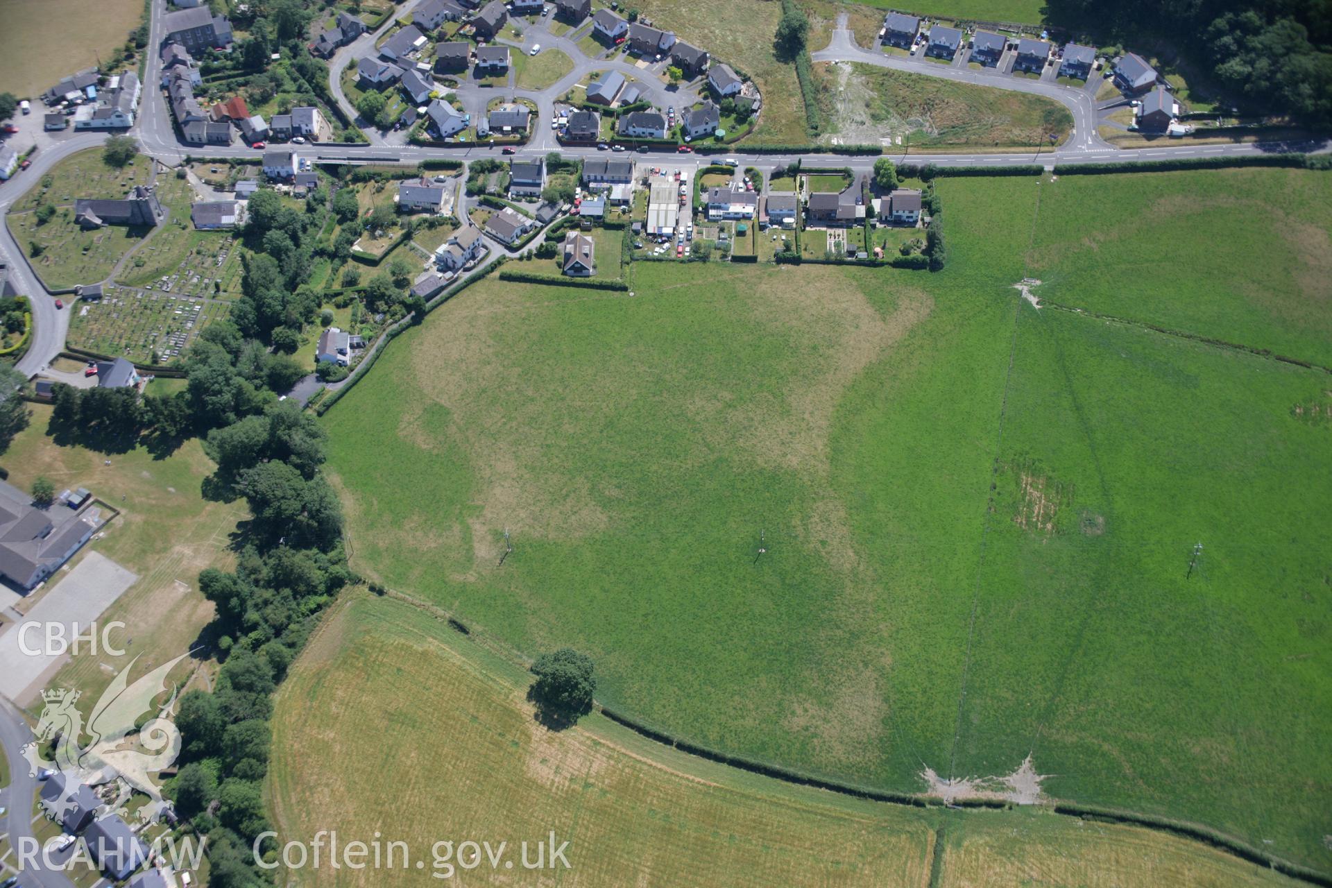 RCAHMW colour oblique aerial photograph of cropmarks at Llanilar. Taken on 17 July 2006 by Toby Driver.