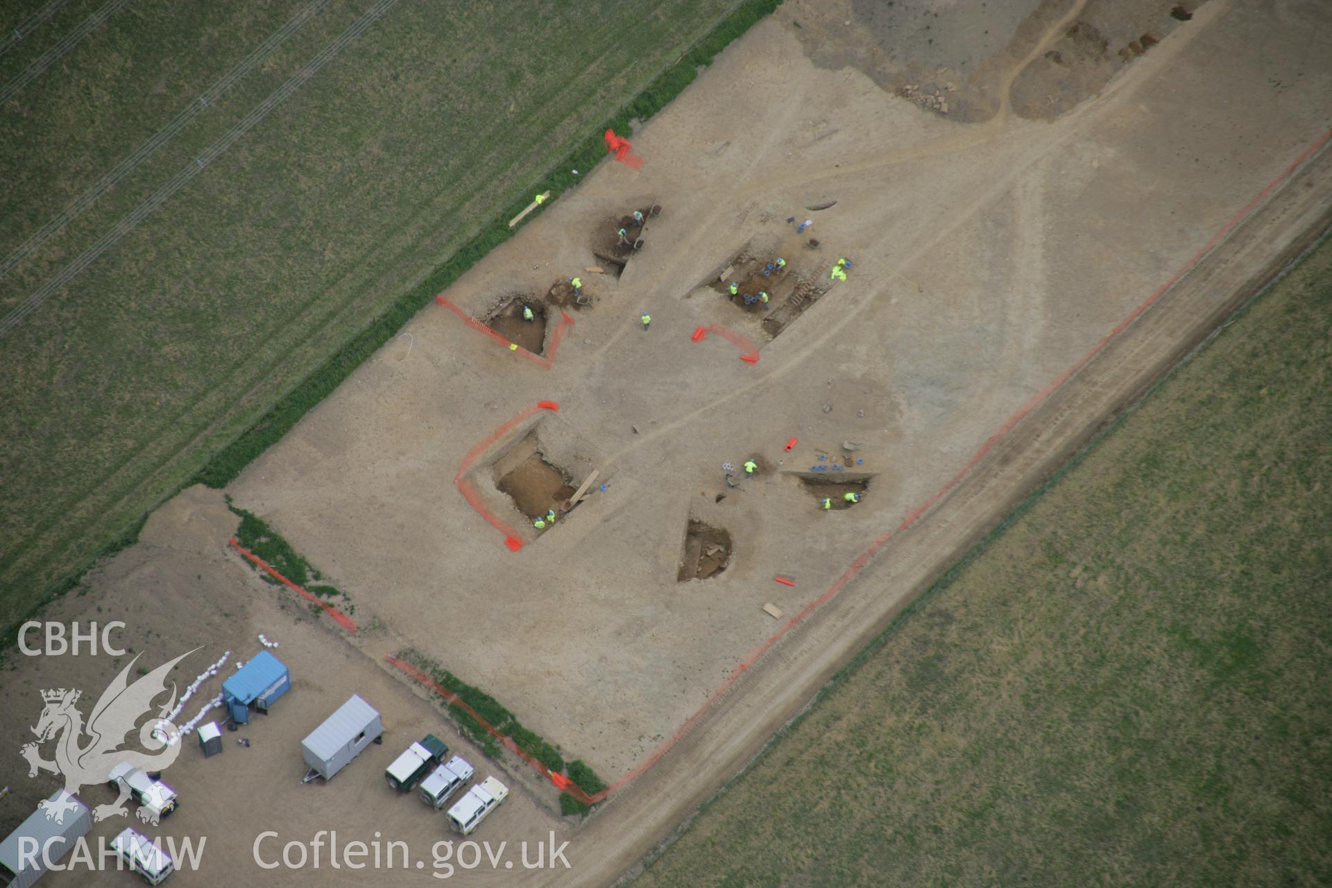 RCAHMW colour oblique aerial photograph of Vaynor Farm Henge showing excavations. Taken on 15 June 2006 by Toby Driver.
